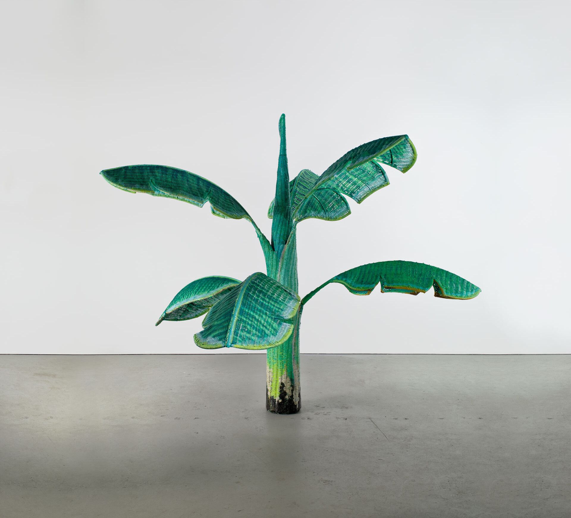 A rattan, metal armature, and paint sculpture by Yutaka Sone, titled Tropical Composition/Banana tree #6, dated 2008 to 2010. 