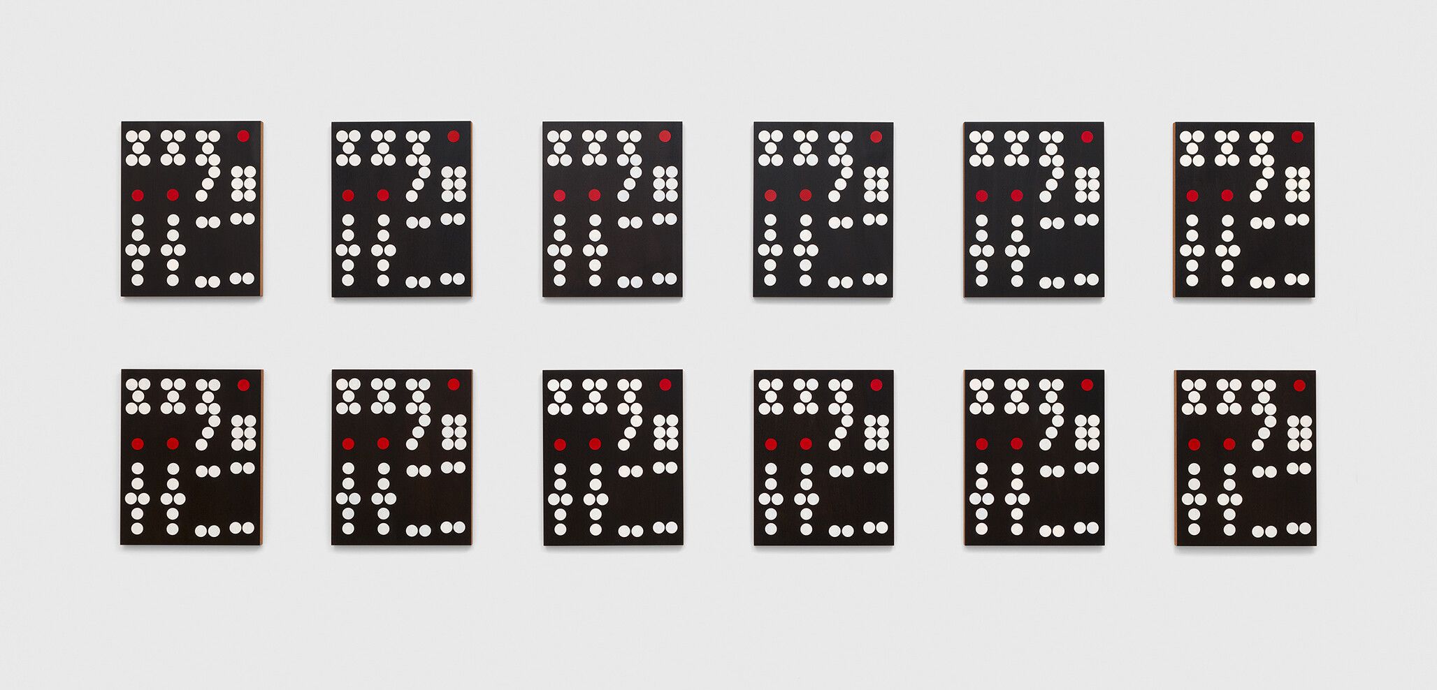 An installation view of a work by Sherrie Levine, titled Hong Kong Dominoes: 1–12, dated 2017.