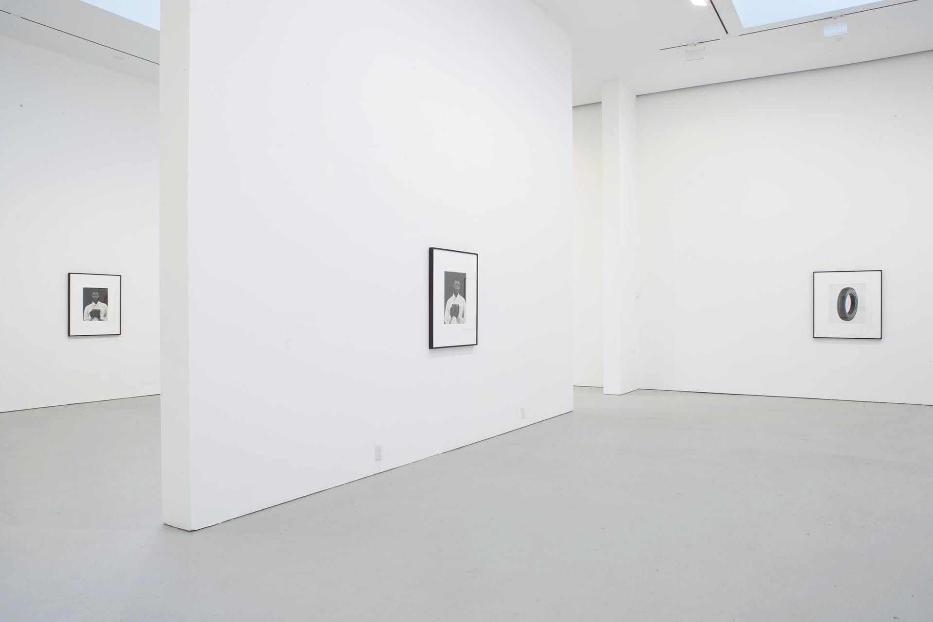 Installation view of the exhibition, For Example: Dix Huits Leçons Sur La Société Industrielle, at David Zwirner in New York, dated 2008.