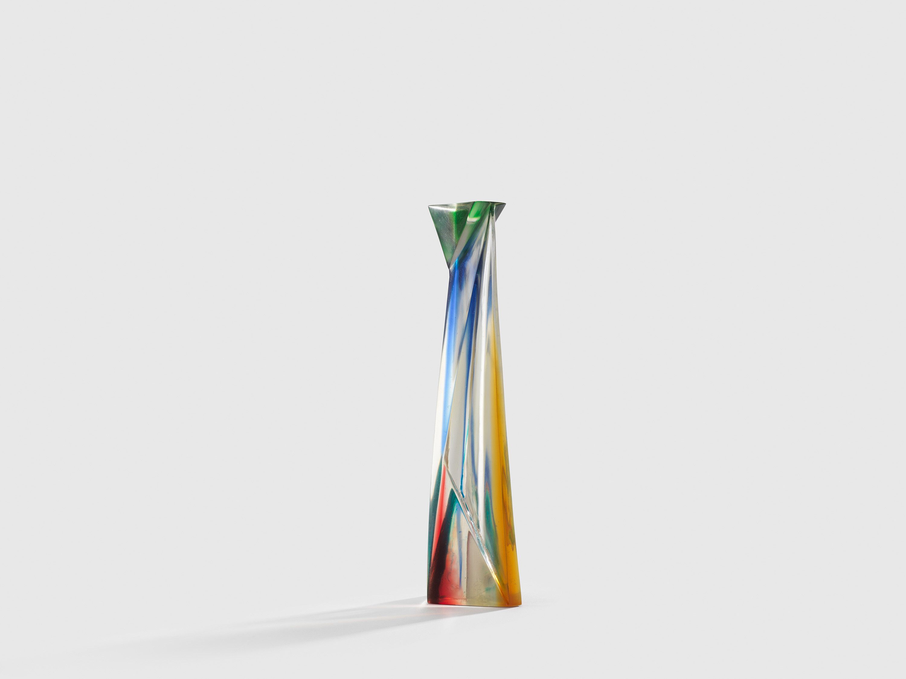 A polyester resin sculpture by Leo Amino, titled Refractional #229, dated 1987.
