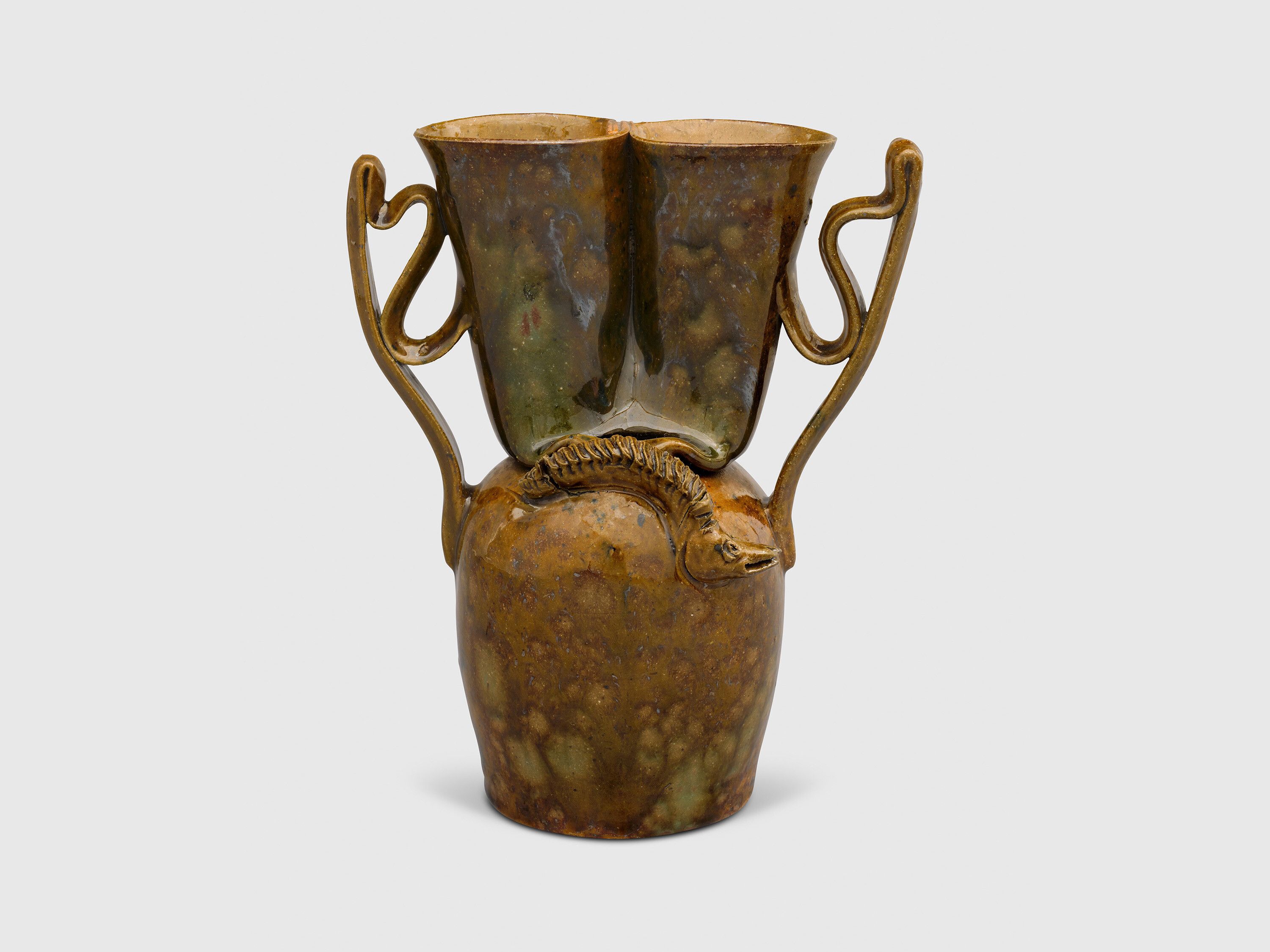 A sculpture by George Ohr, titled Handled vase with snake, dated 1897 to 1900.