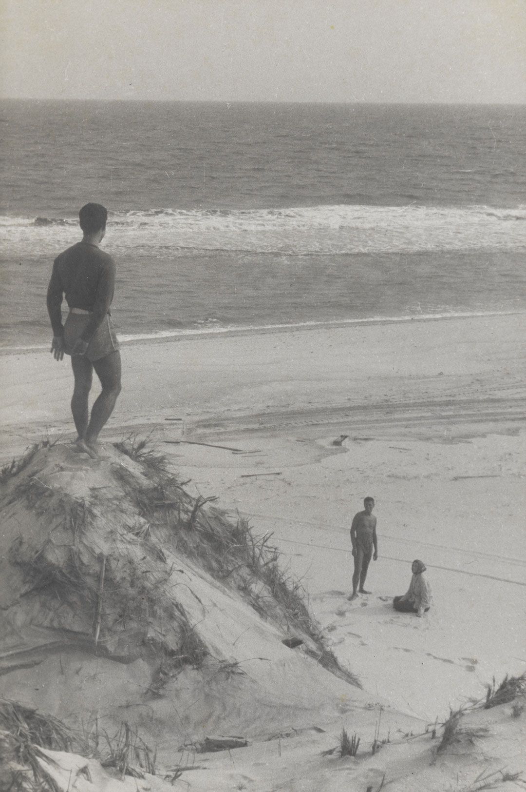 A gelatin silver print by PaJaMa, titled José, Paul, and Fidelma on Dunes, Fire Island, dated 1939.