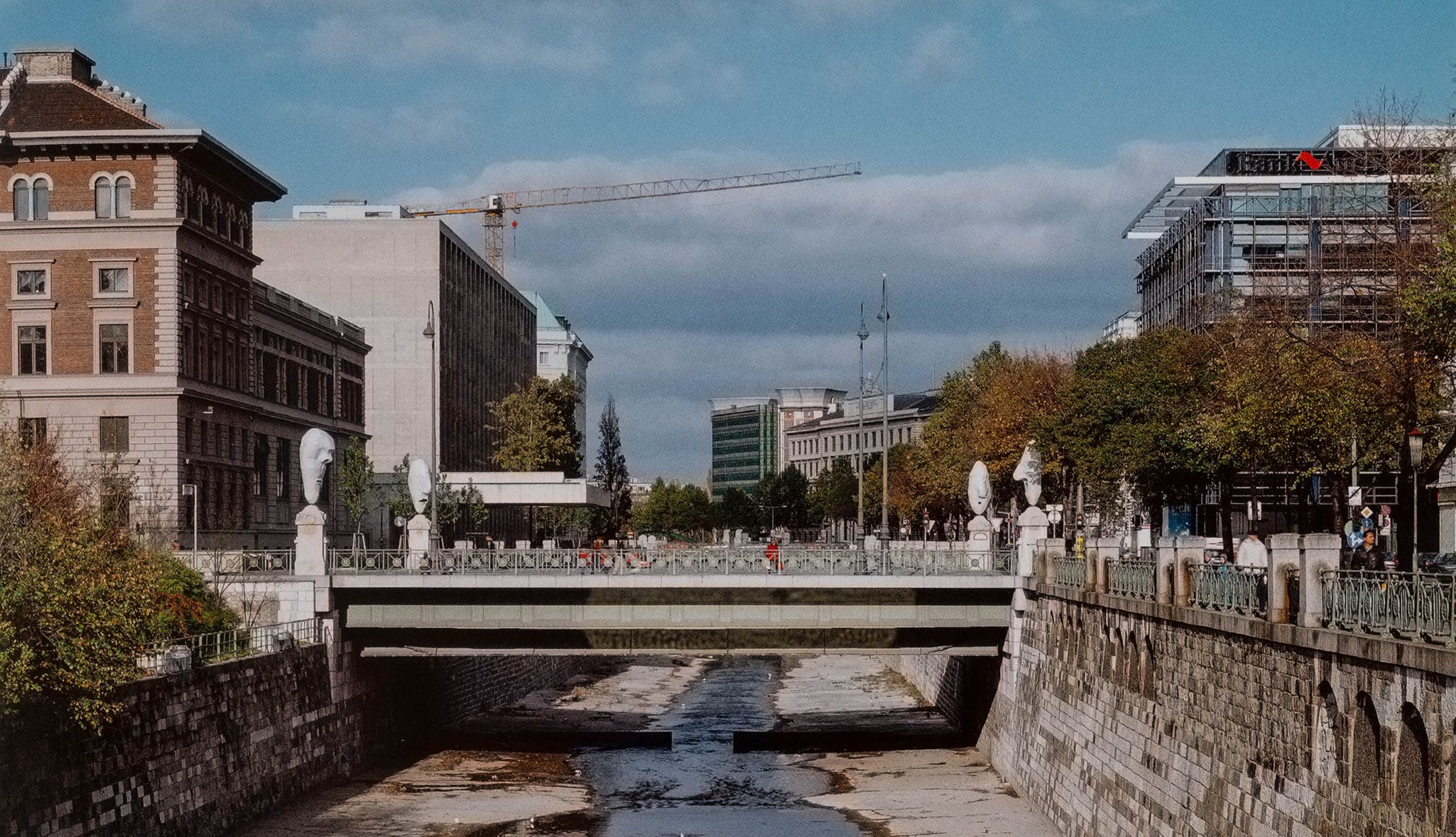 A photo of Franz West's Lemurenköpfe (Lemure Heads), 1992/2000 at the Stubenbrucke in Vienna.