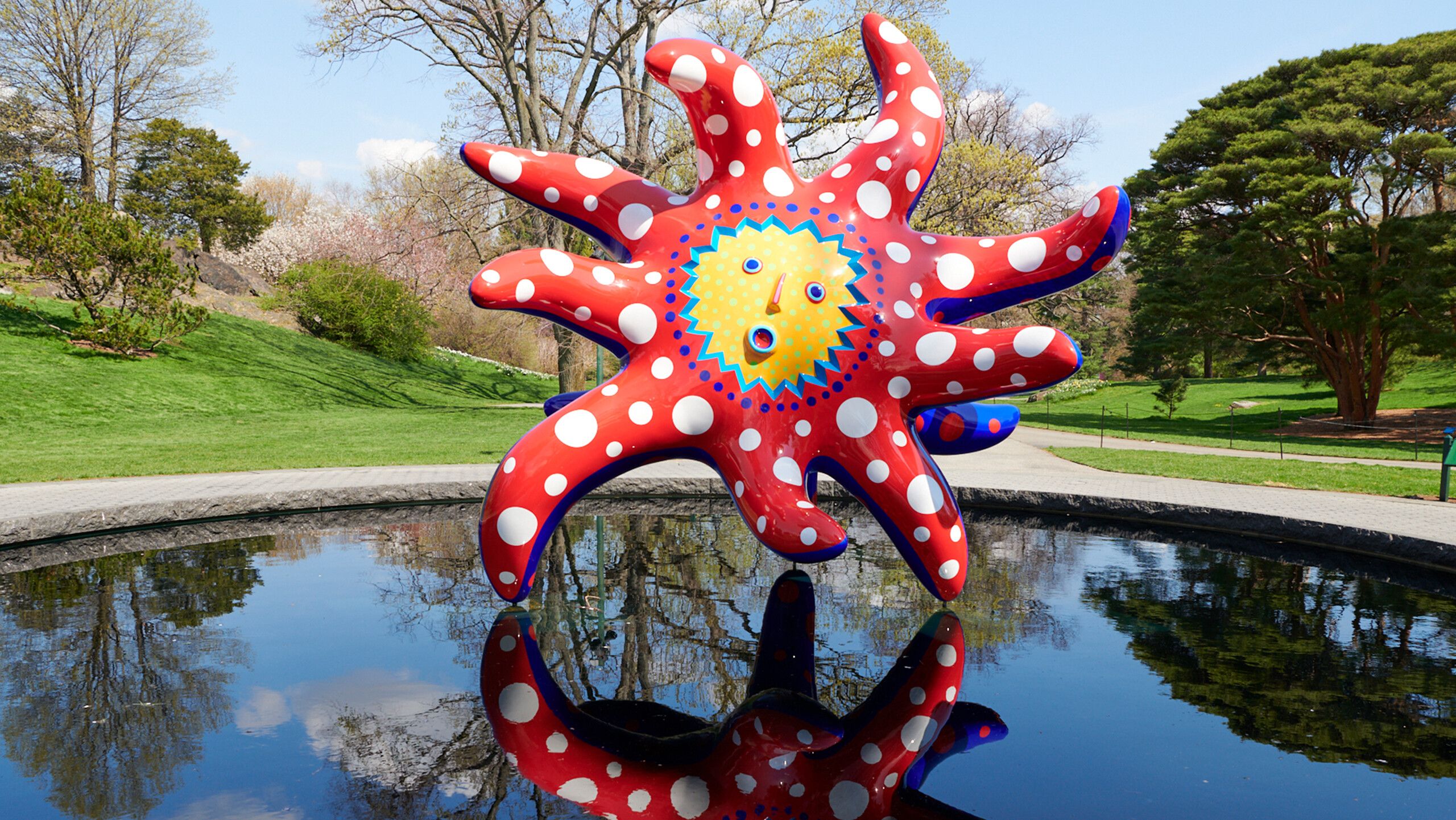 Installation view from the exhibition titled Kusama Cosmic Nature at the New York Botanical Garden in the Bronx, New York, dated 2021