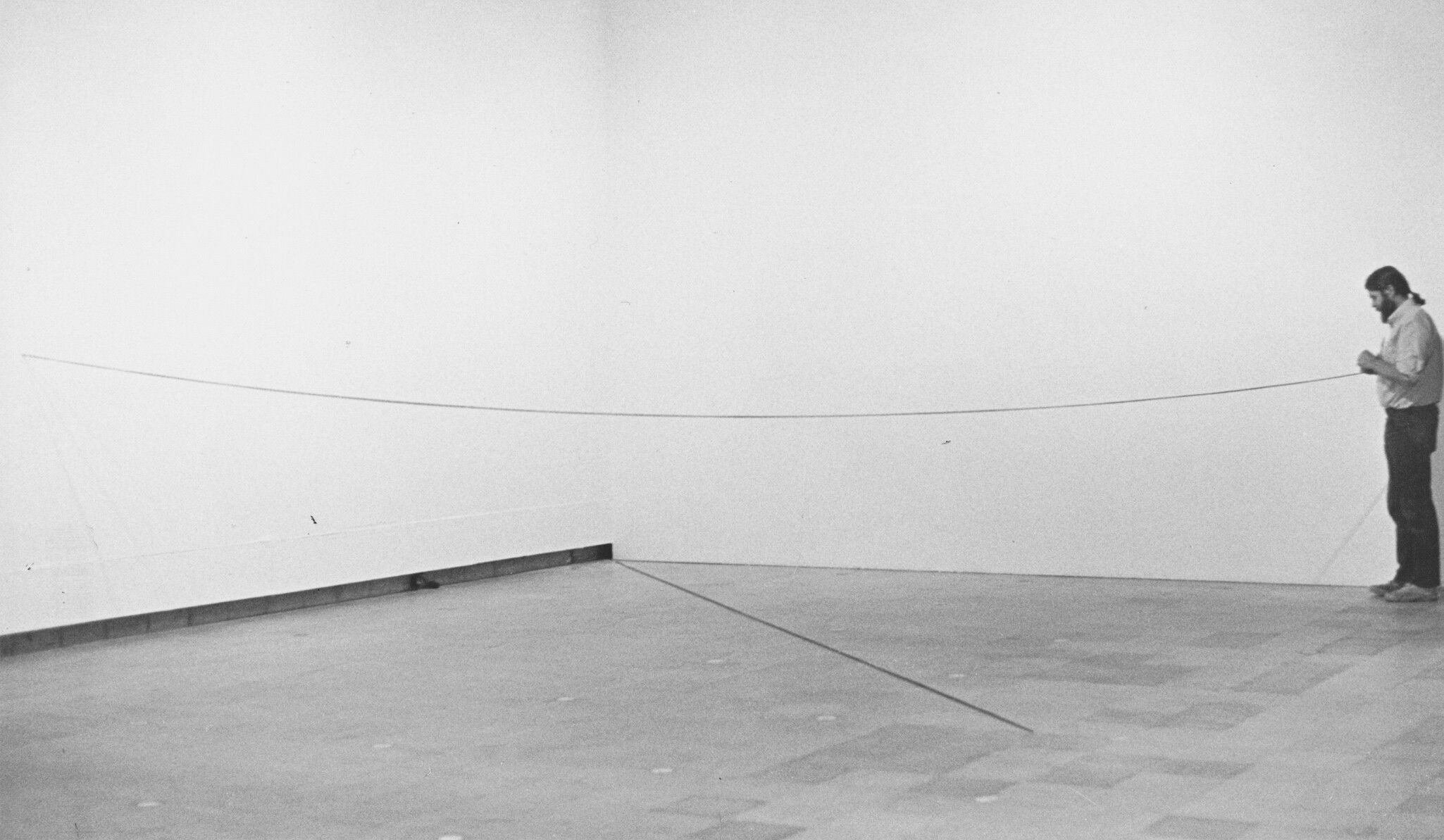 A Photo by Christine Cadin of Fred Sandback at Hayward Gallery, London, circa 1980. 