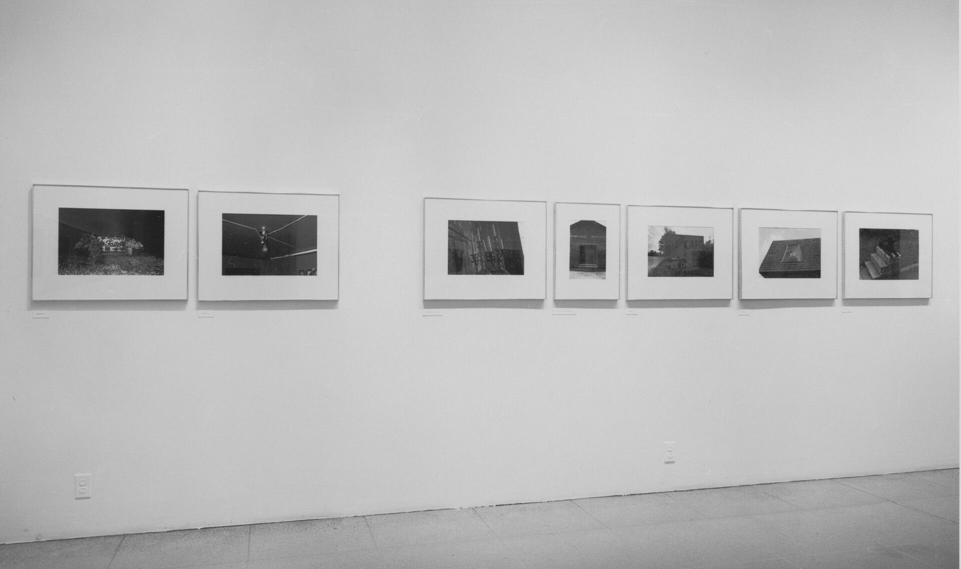 Installation view of a William Eggleston exhibition in Moma, New York, 1976