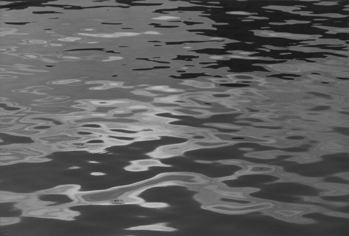 A silver gelatin print by Roy DeCarava, titled Dark water, dated 1960.