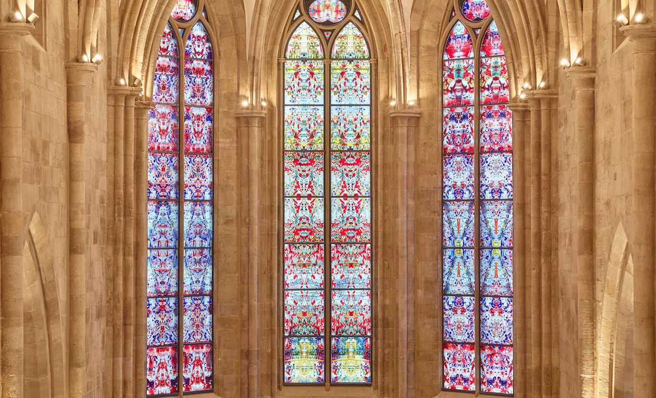 A photo of stained glass windows designed by Gerhard Richter at a Gothic monastery in Tholey, Germany, in 2020.