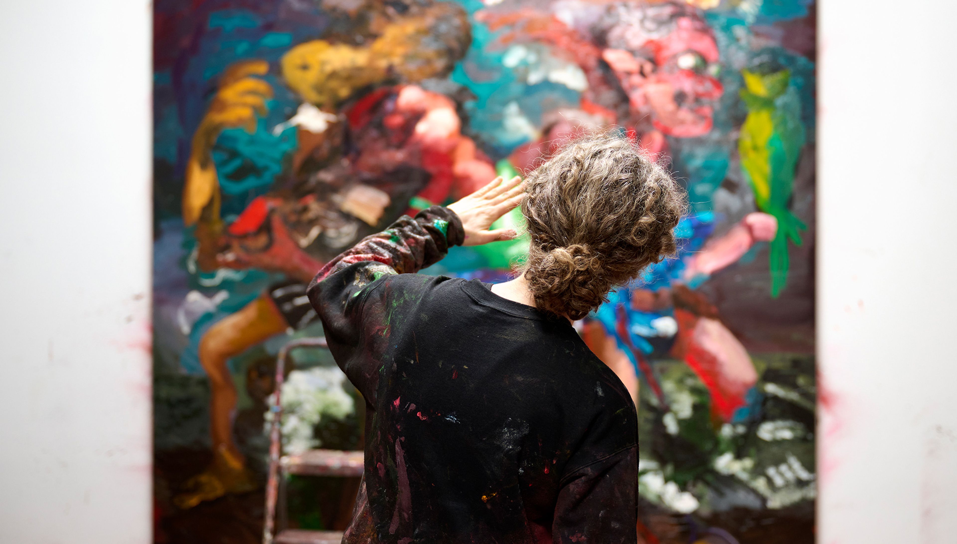 A photo of Dana Schutz in her studio, 2023. Photo by Jason Schmidt