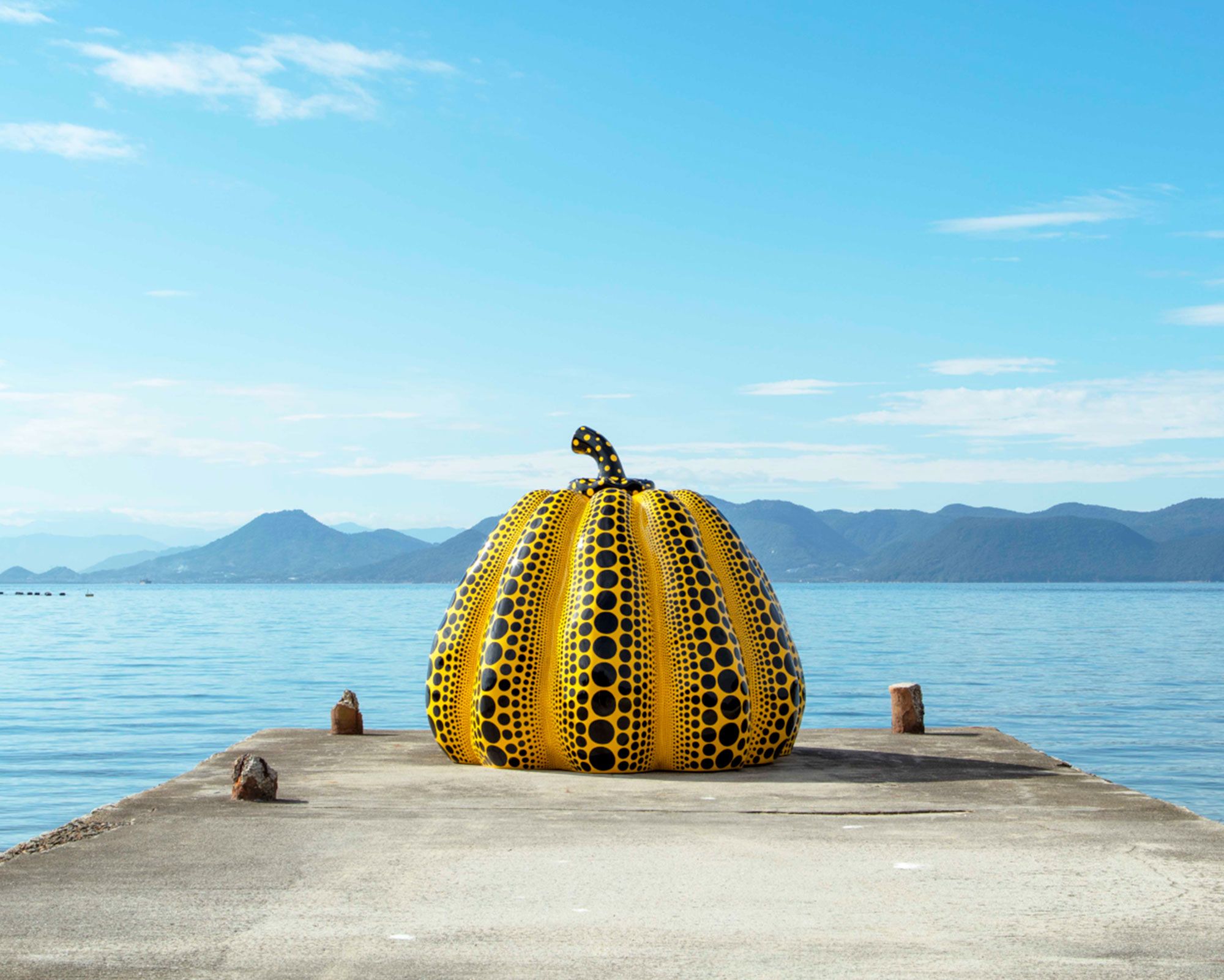An Installation view, Yayoi Kusama, Pumpkin, dated 2022, Naoshima, Japan. Photo by Tadasu Yamamoto. © YAYOI KUSAMA