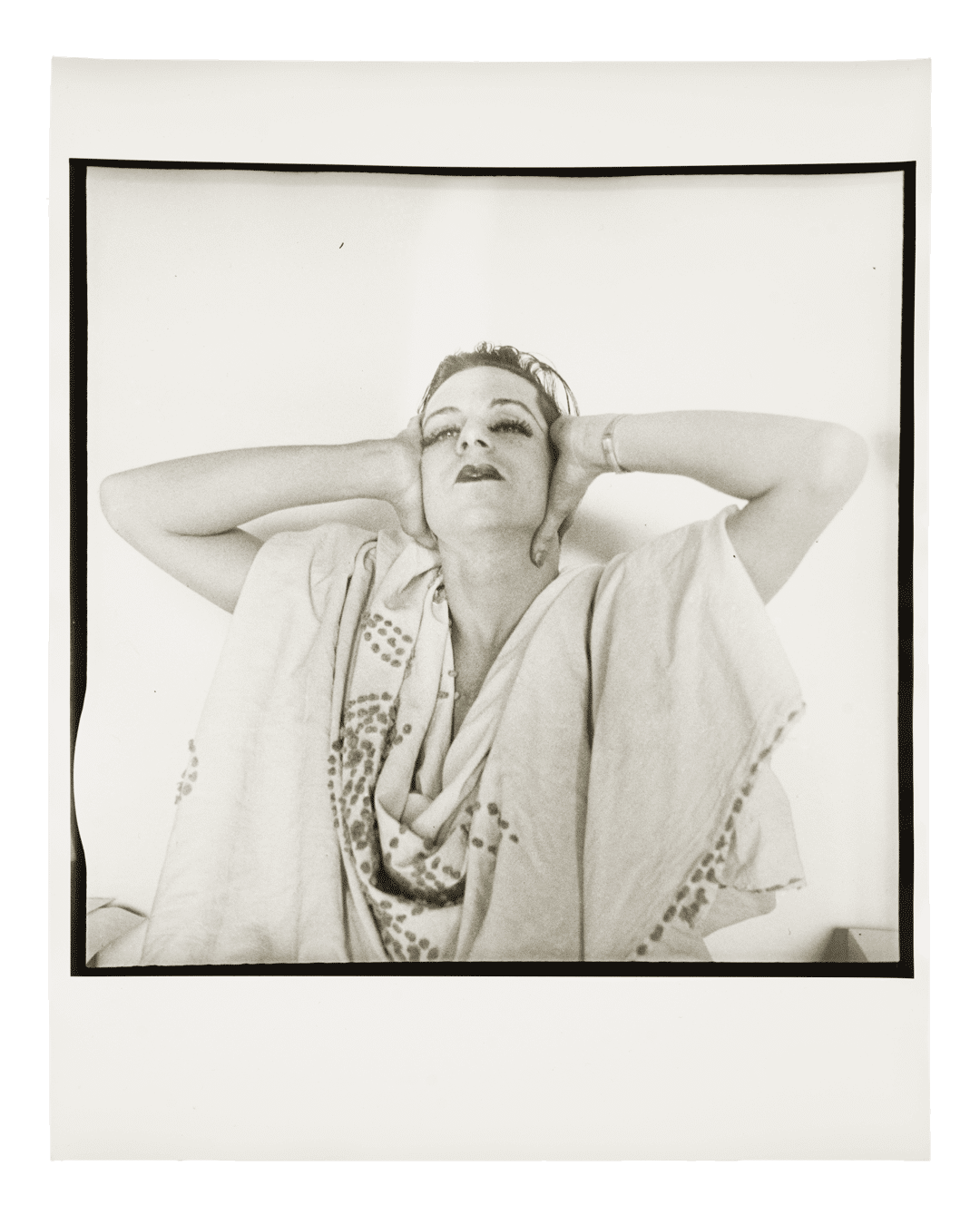 A gelatin silver print by Charles Henri Ford, titled Parker Tyler in Drag, circa 1985.