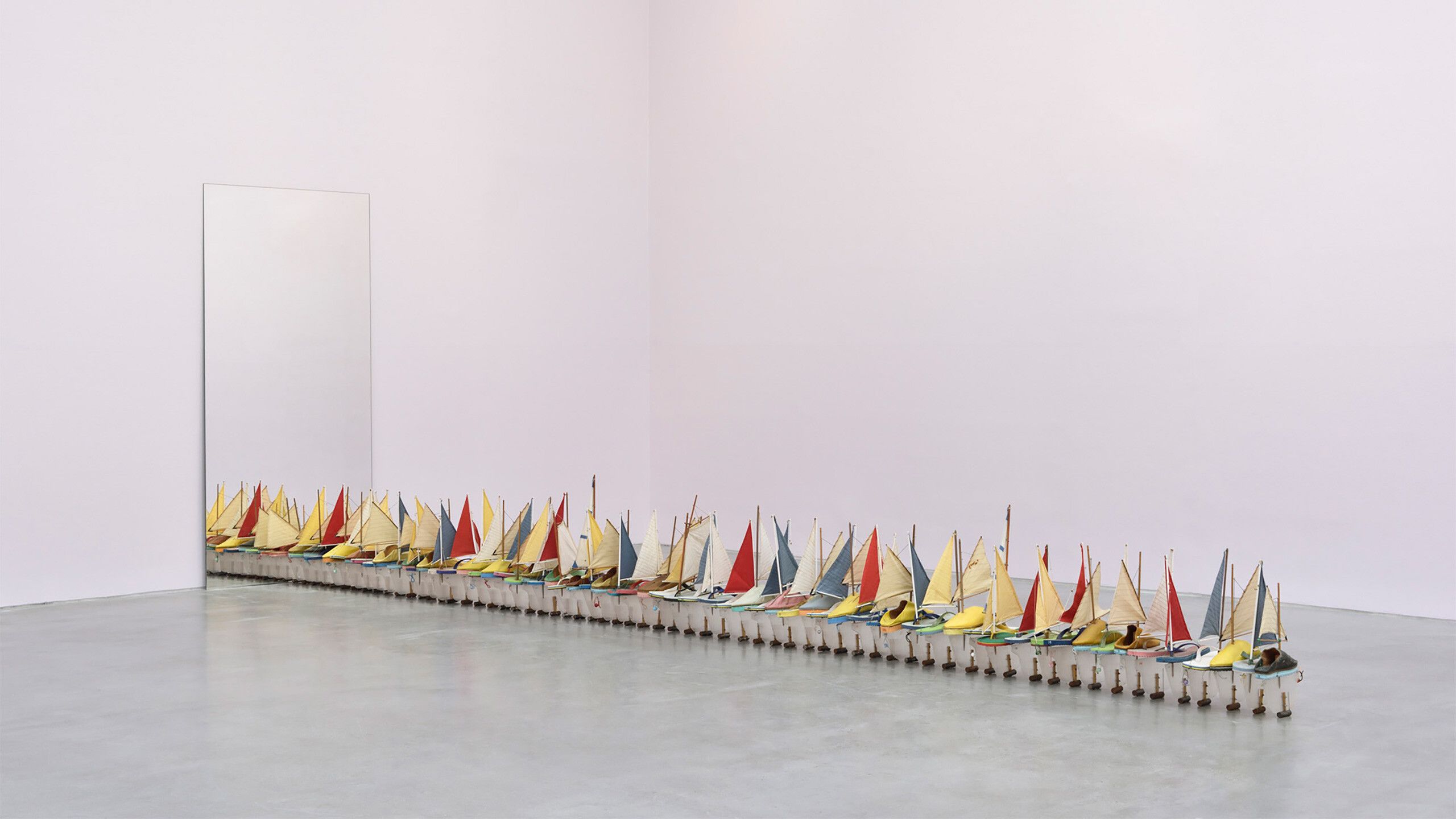 A sculpture by Francis Alÿs, titled 64 Shoe Boats, dated 2007-2008.