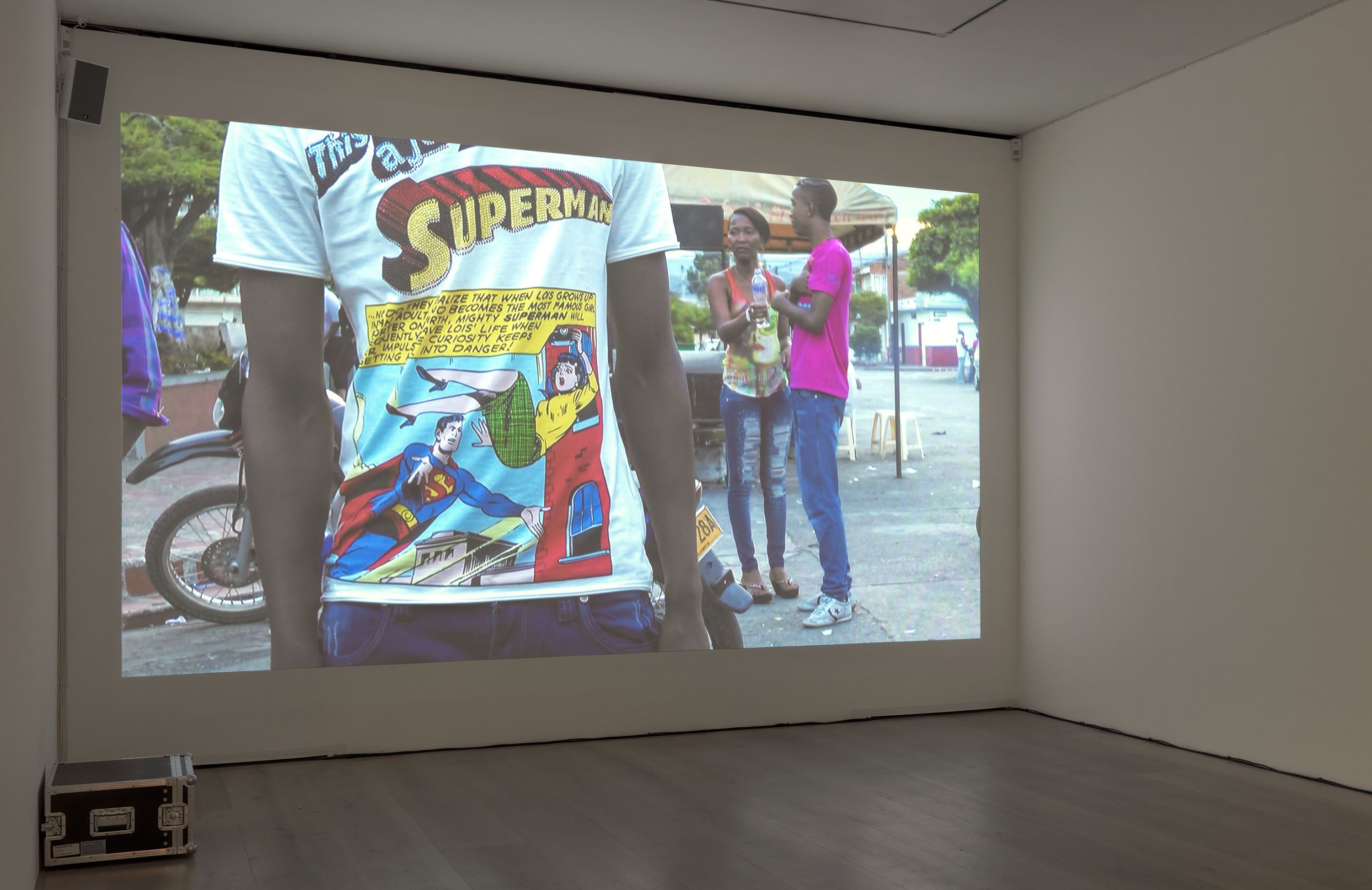 A video by Oscar Murillo, titled meet me! Mr. Superman, dated 2013 to 2015.