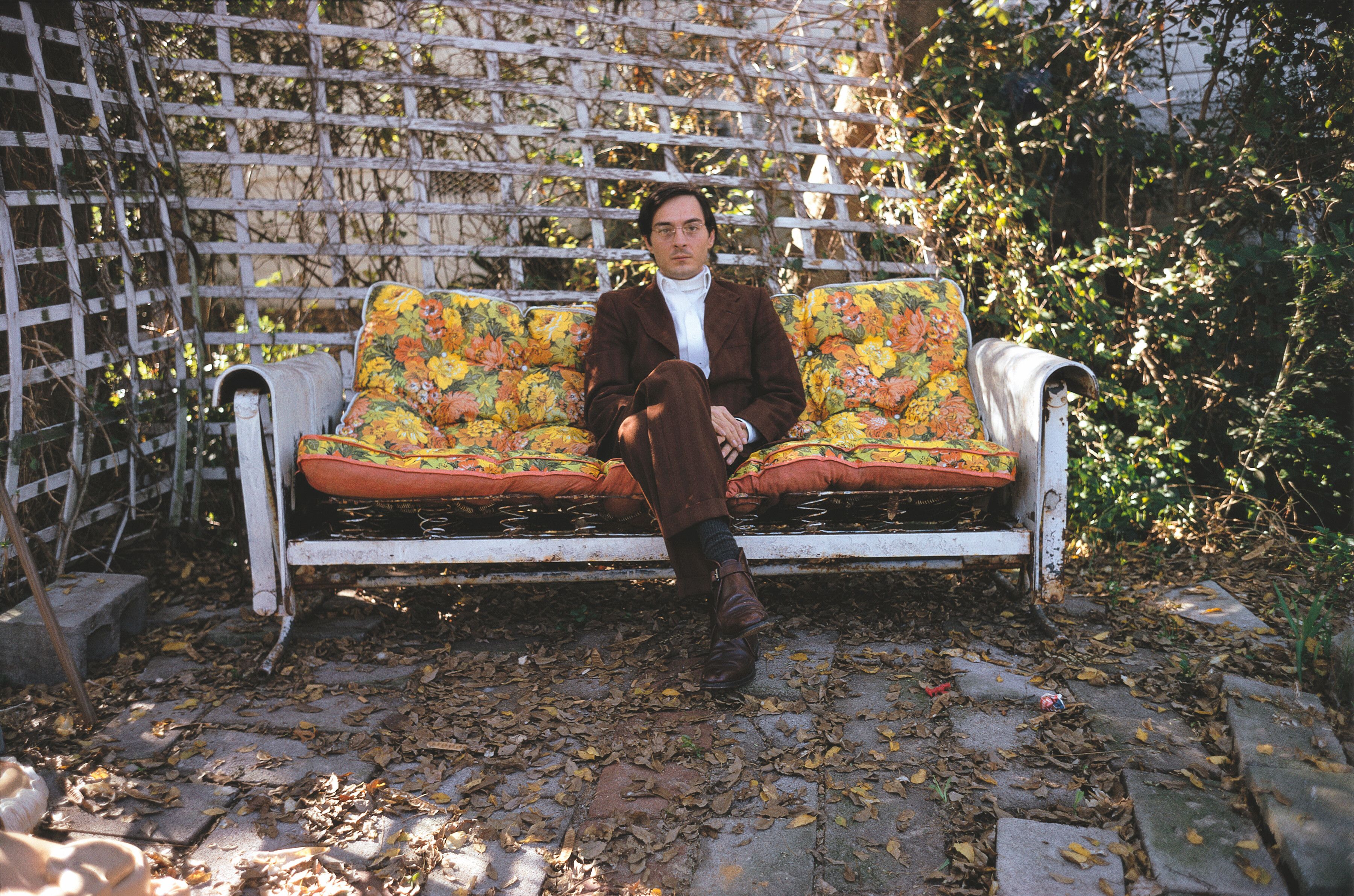 William Eggleston seated on bench