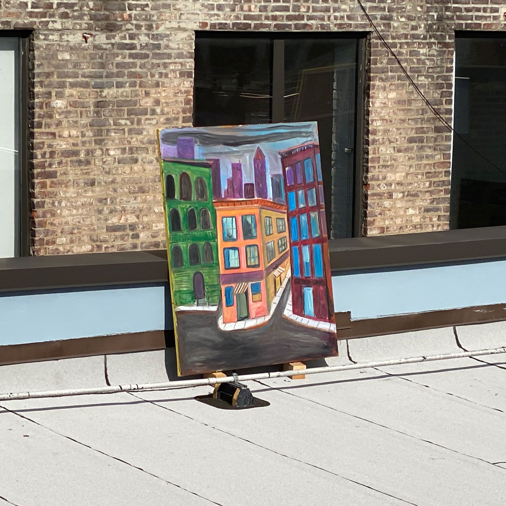 An installation view of the exhibition titled Josh Smith: High As Fuck on the artist's studio roof in Brooklyn, New York, dated 2020.