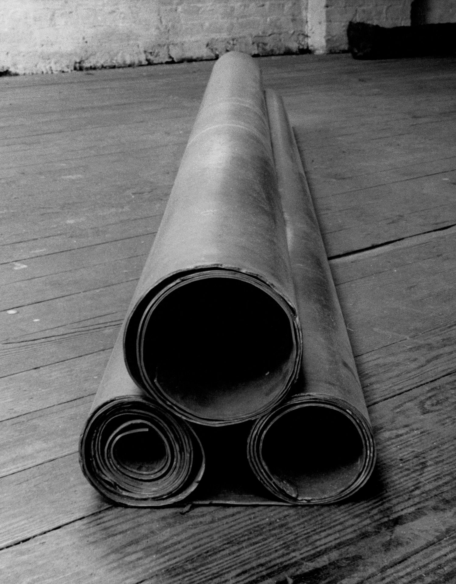 A lead sculpture by Richard Serra, titled Slow Roll: For Philip Glass, dated 1968.