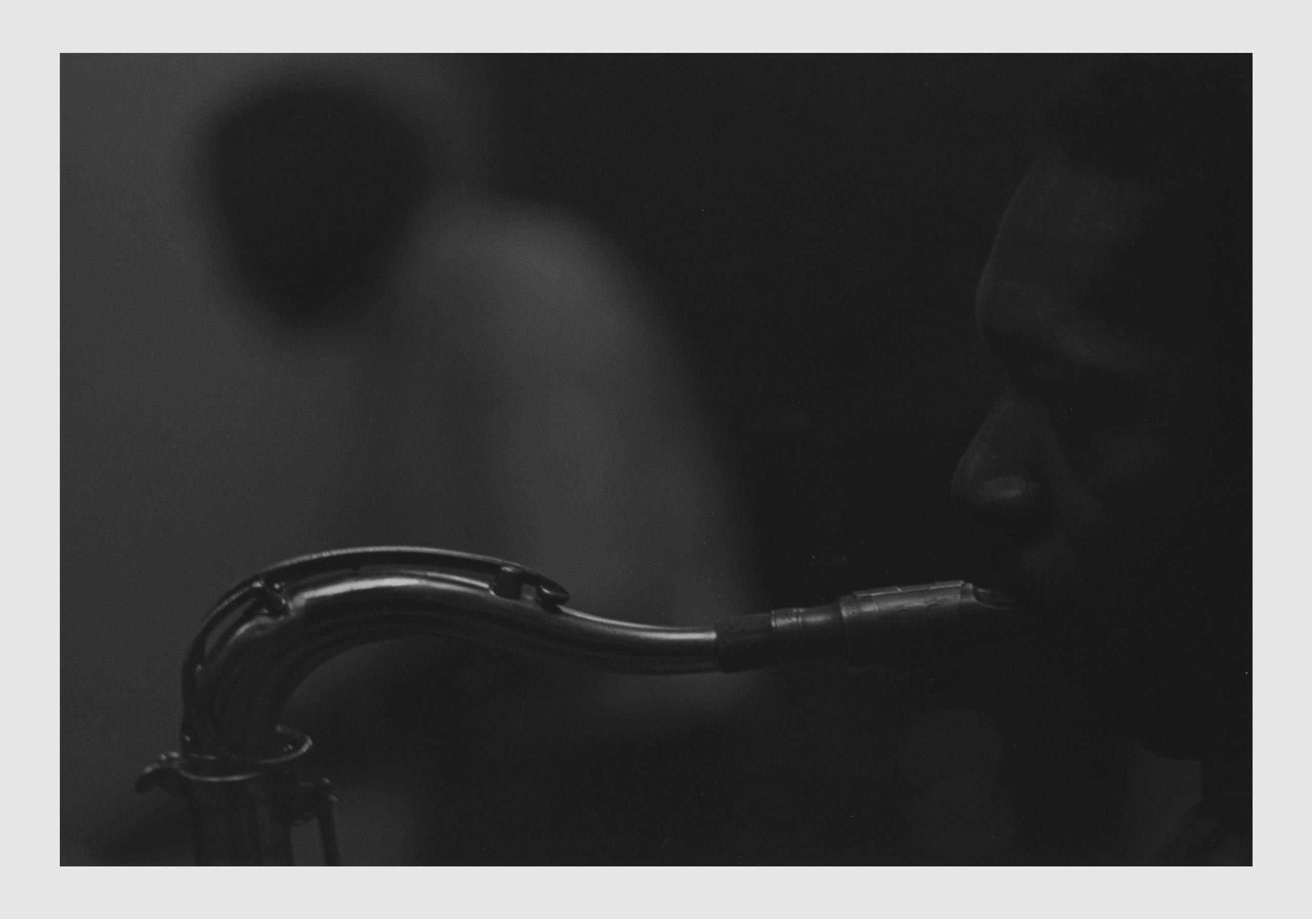 A photograph by Roy DeCarava, titled Coltrane and Elvin, dated 1960.