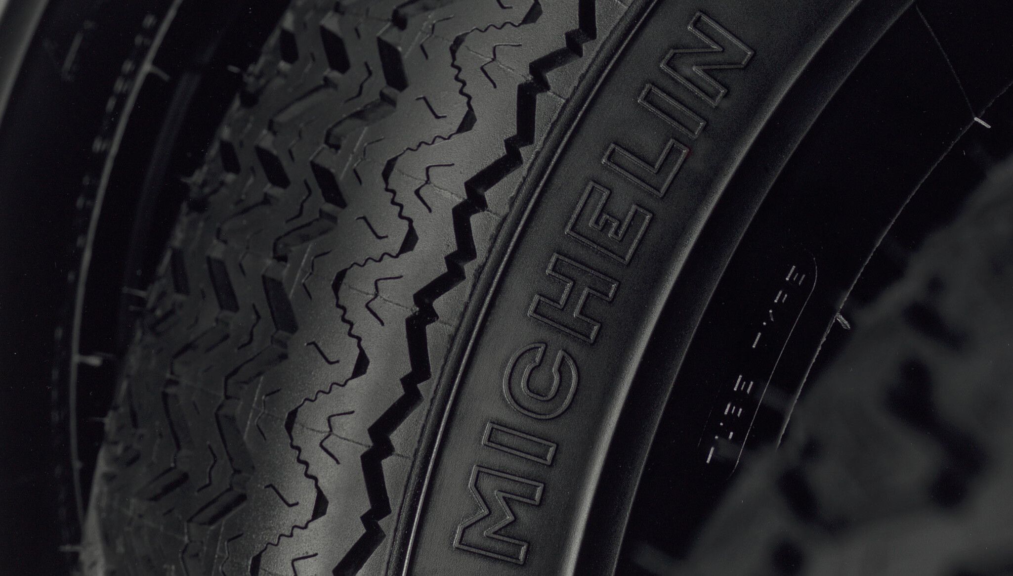 A photo by Christopher Williams titled 180HR15 Michelin XAS Manufactured by: Tigar Tyres d.o.o., Pirot, Serbia, Est. 1935 Parent Company: SCA Compagnie Générale des Établissements Michelin, Clermont-Ferrand, France, Est. 1889 Studio Rhein Verlag, Düsseldorf February 22, 2016, dated 2016