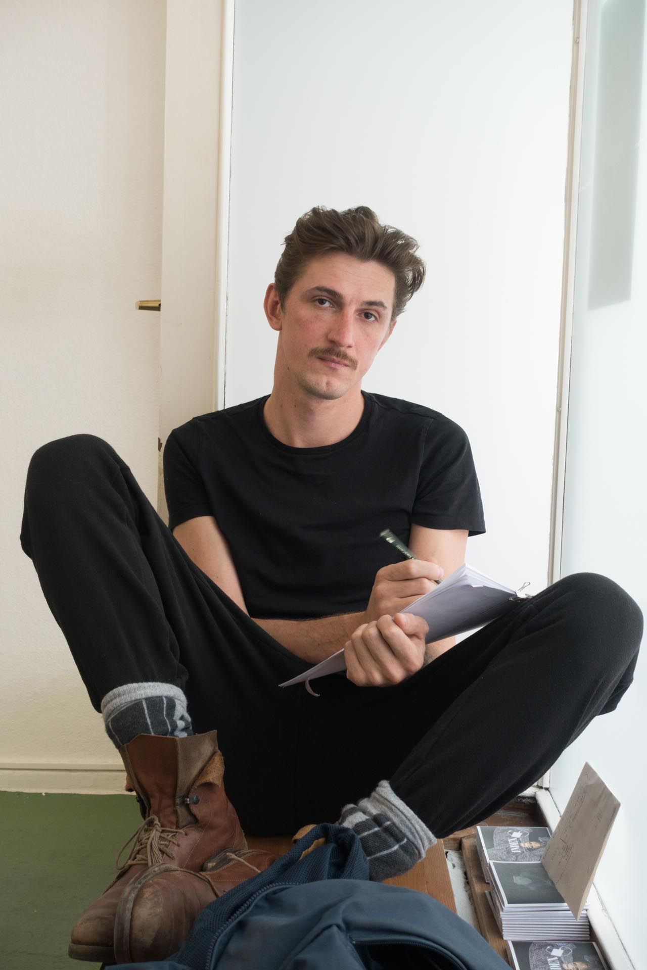 A photograph by Wolfgang Tillmans, titled Eugen, Between Bridges, dated 2015.