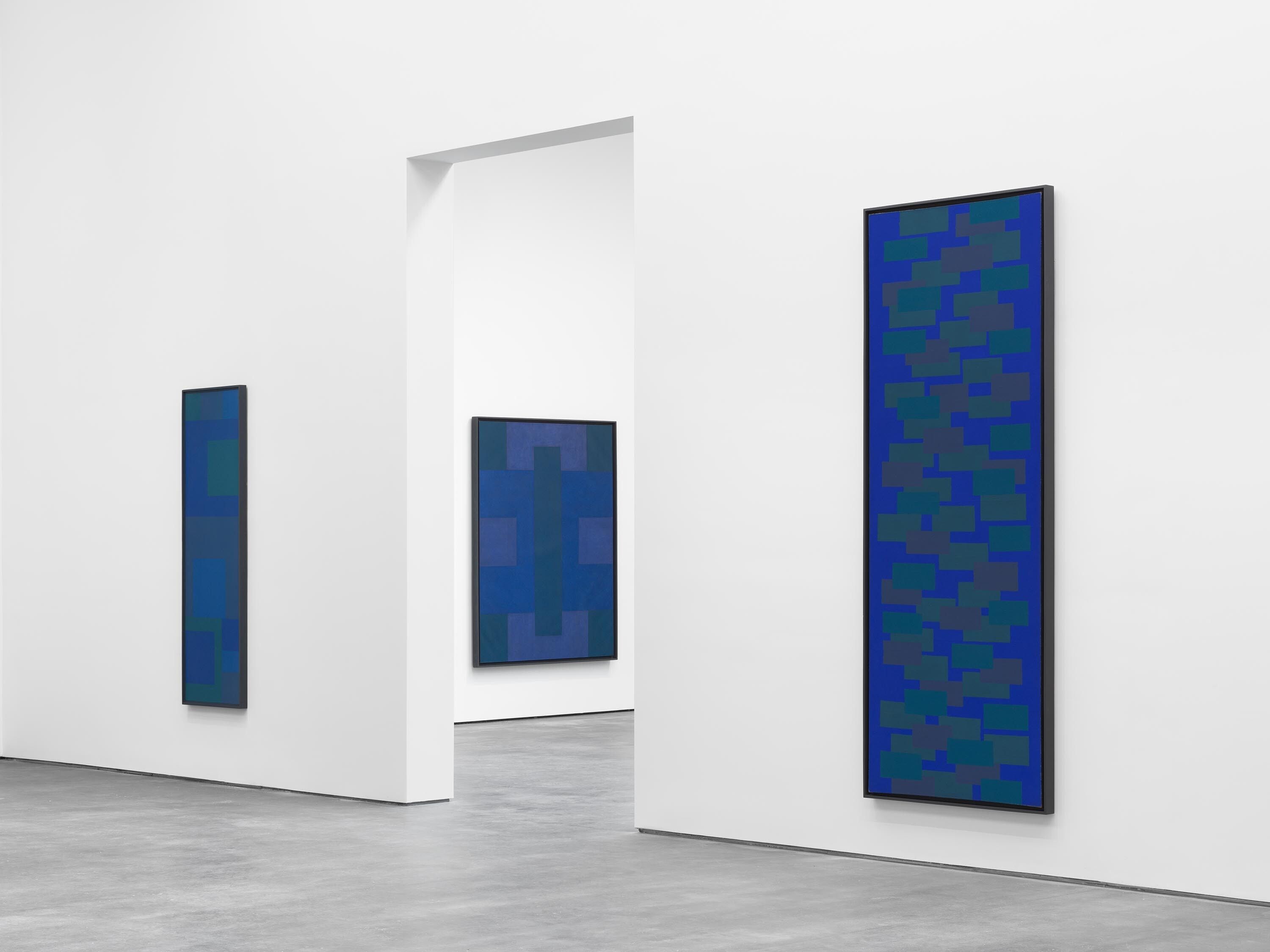 An installation view of an exhibition titled Ad Reinhardt: Blue Paintings, at David Zwirner, New York, in 2017.