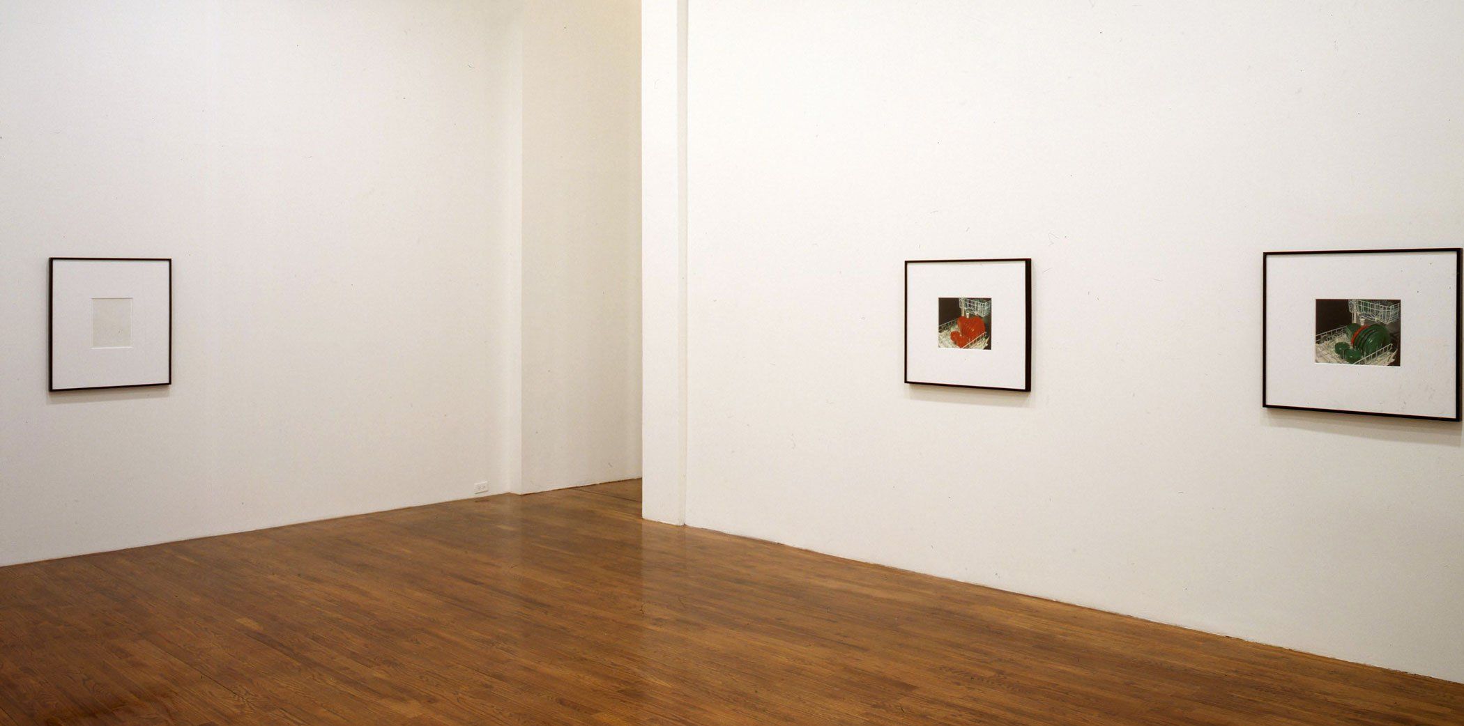 An installation view of the exhibition Christopher Williams: For Example: Die Welt ist schön (Revision 17) Couleur Européenne, Couleur Soviétique, Couleur Chinoise, at David Zwirner New York, dated 2000.