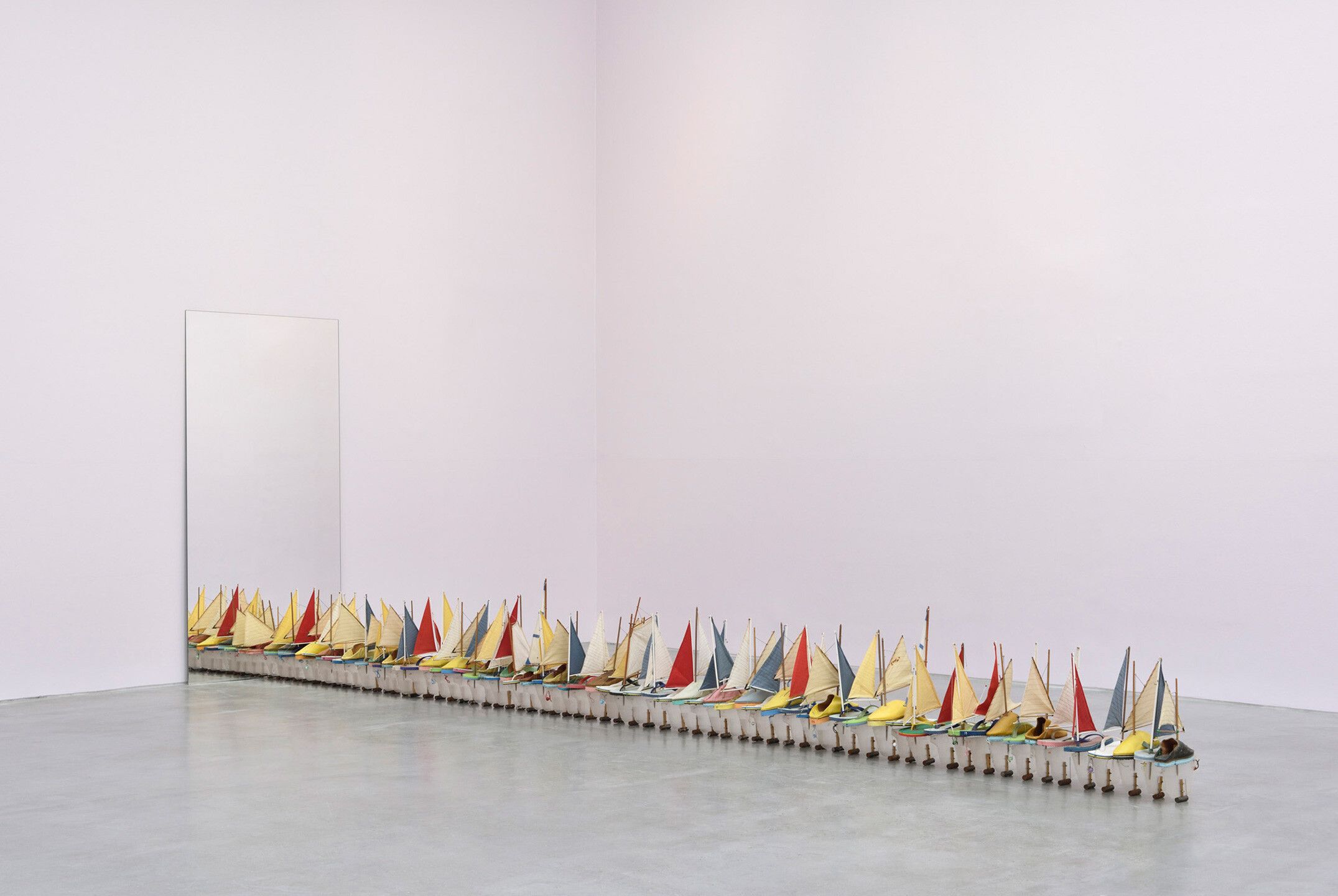 A sculpture by Francis Alÿs, titled 64 Shoe Boats, dated 2007-2008.