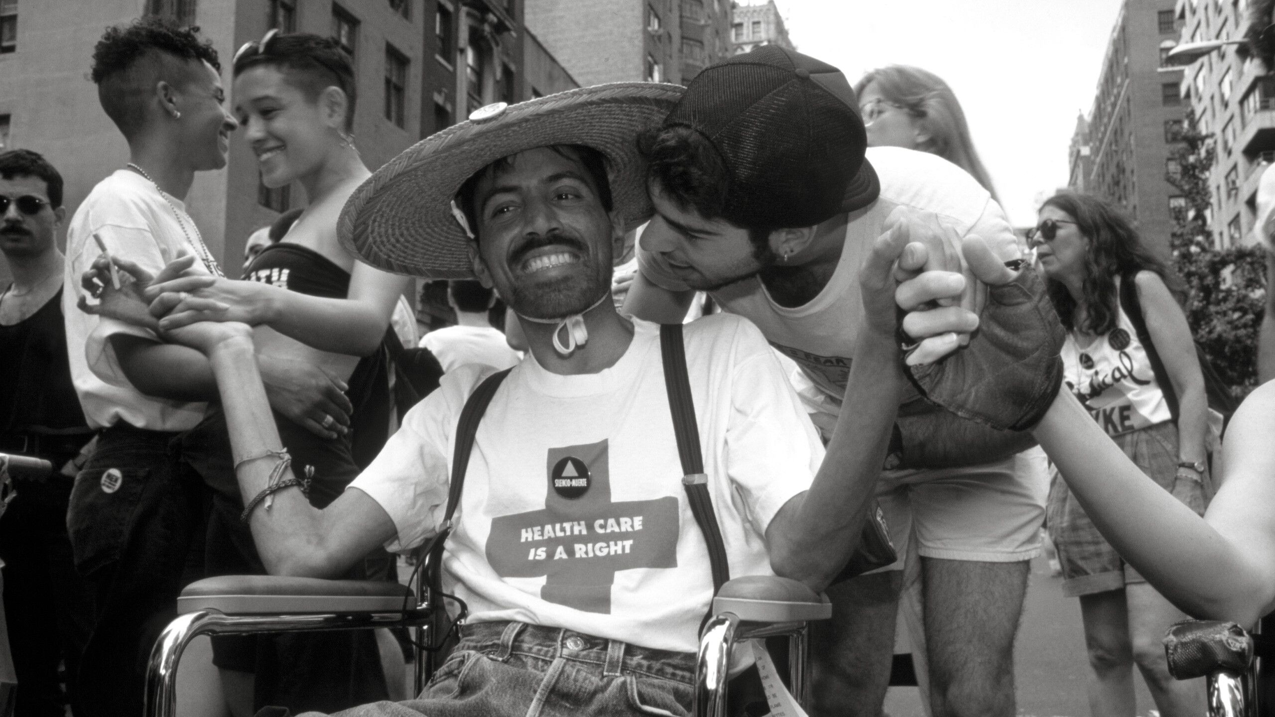 A photo by T.L. Litt of Ray Navarro and David Robinson at the 1990 Pride Parade.