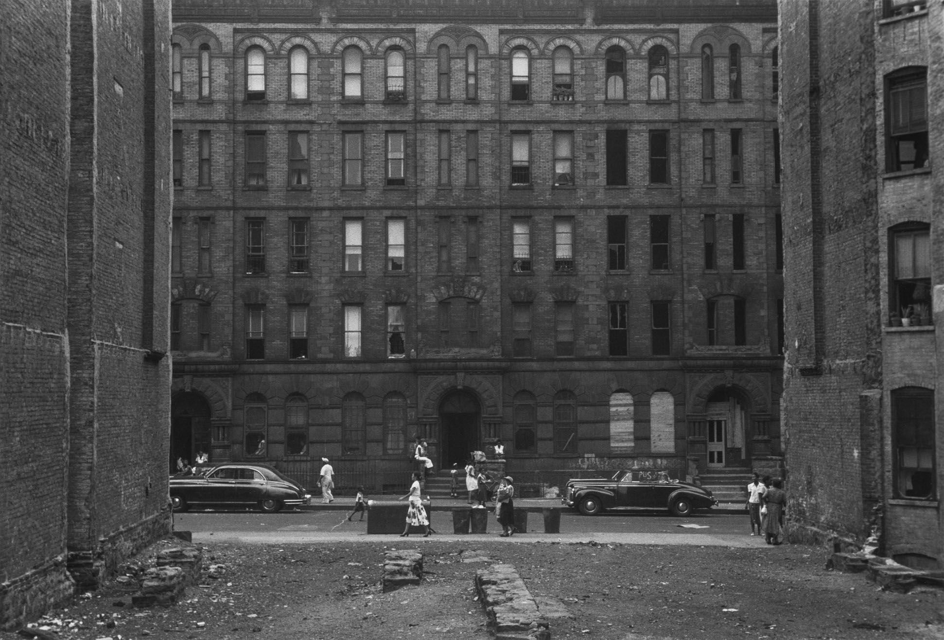 A detail from a photo by Roy DeCarava, titled 117th Street, New York, dated 1951.