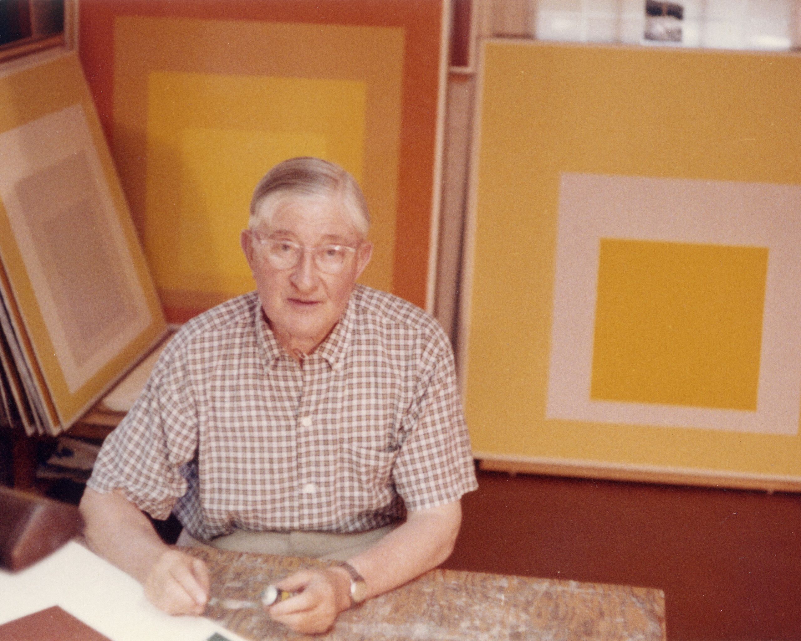 A portrait of Josef Albers sitting in his studio, dated 1960