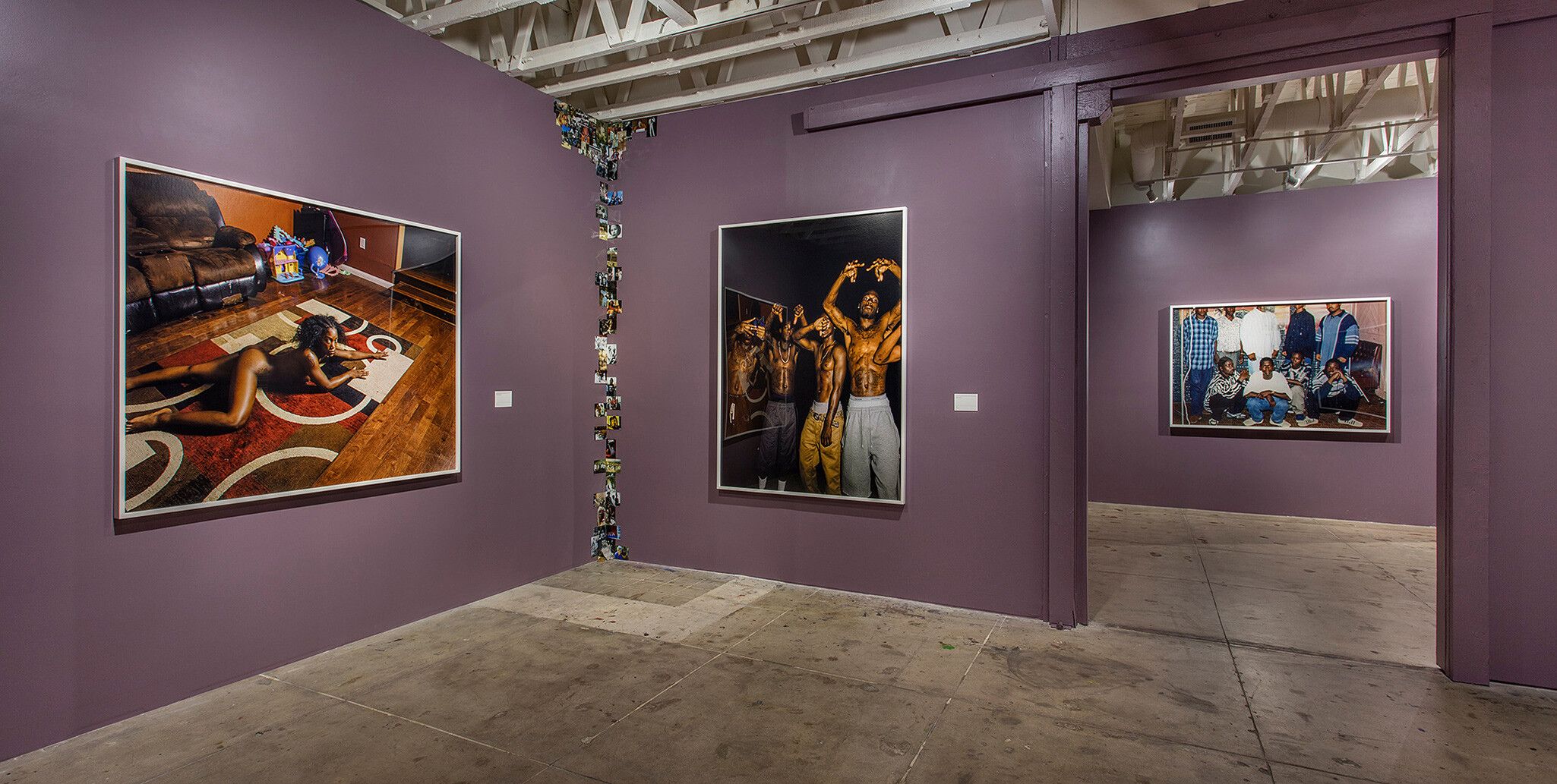 An installation view of an exhibition titled Deana Lawson: Planes at The Underground Museum in 2018.