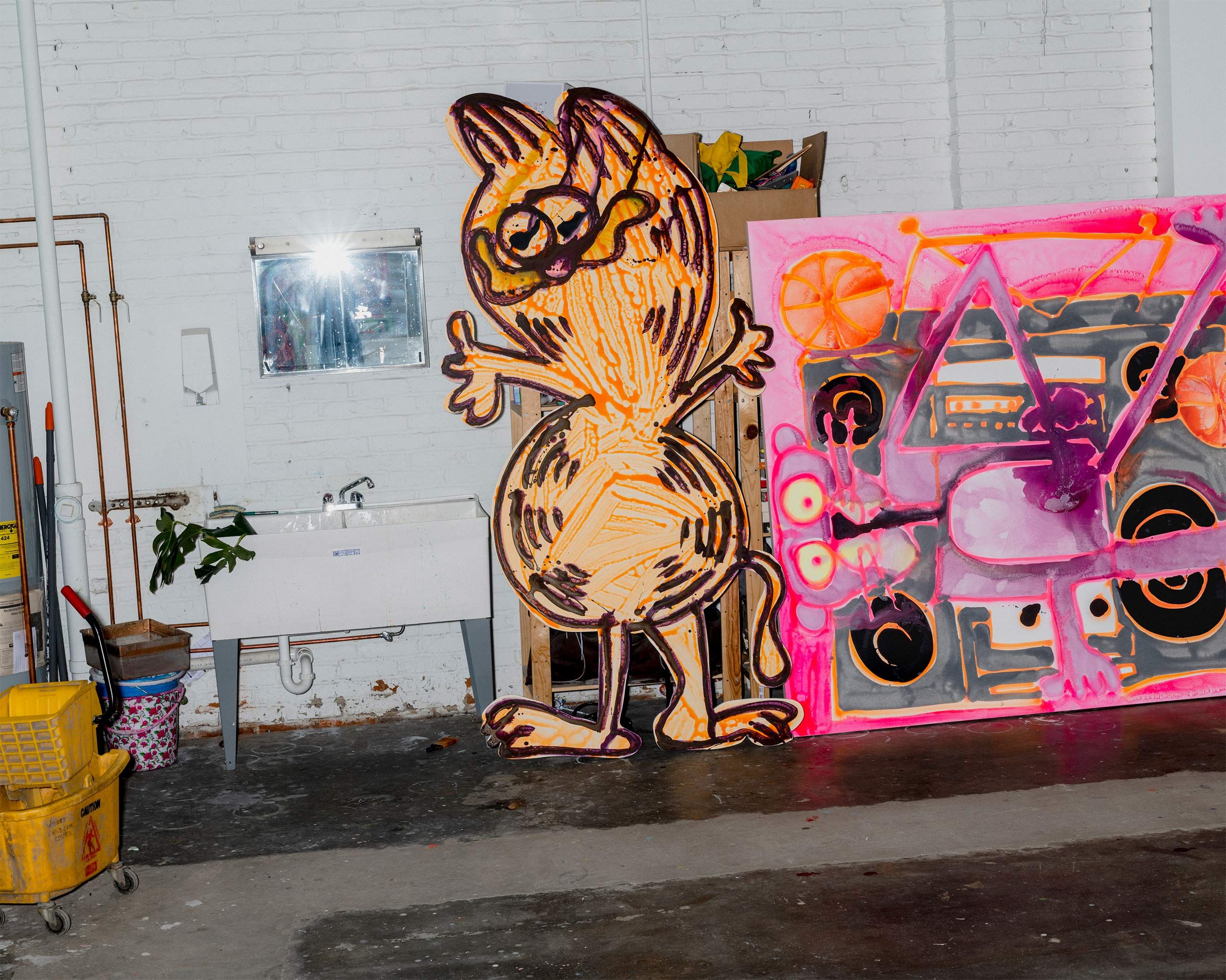 A Photo by Lyndon French of Works featuring Garfield and the Pink Panther—two recurring subjects for Bernhardt—in the artist’s studio in St. Louis, 2021. 