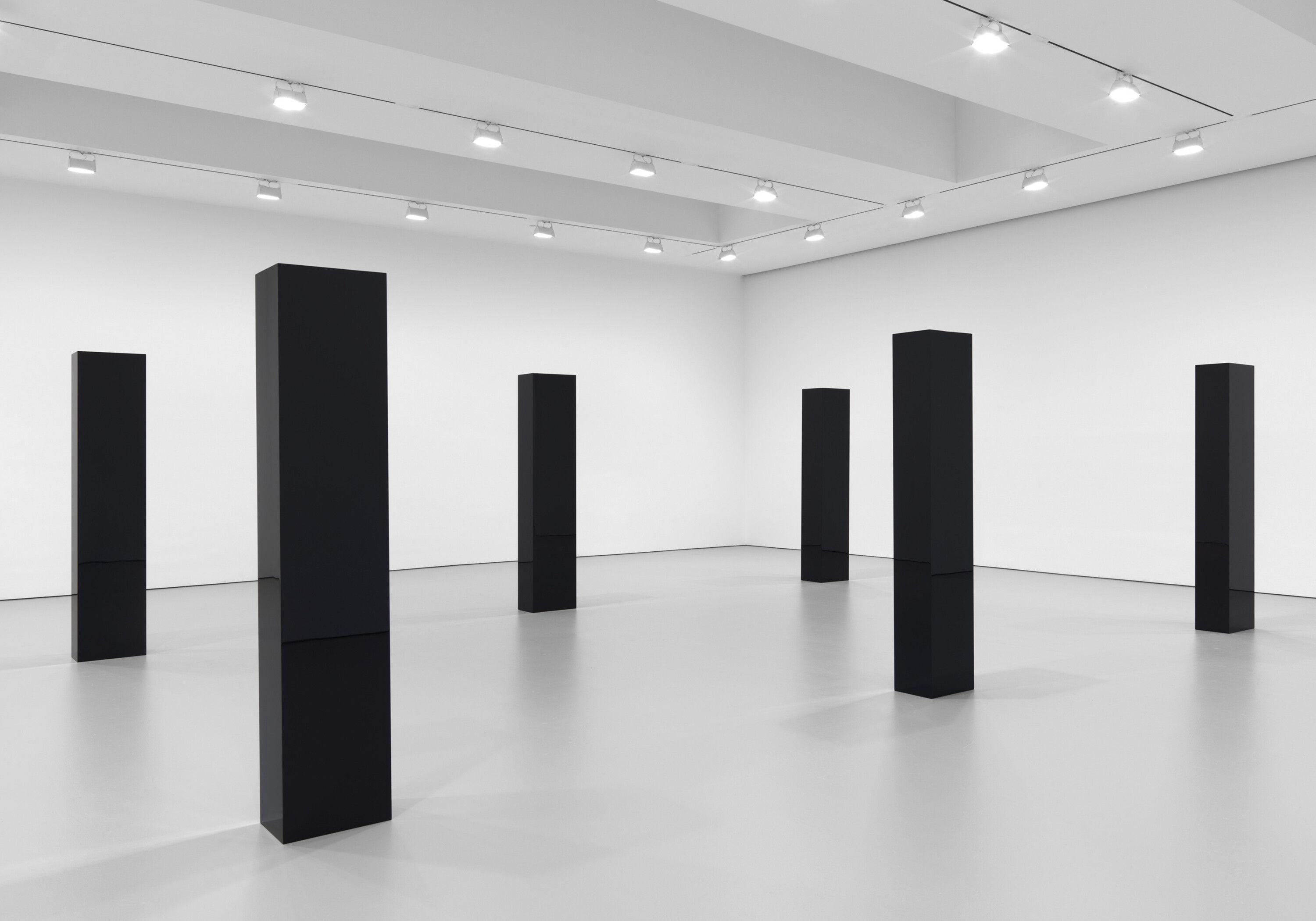 A sculpture by John McCracken, titled Six Columns, dated 2006.