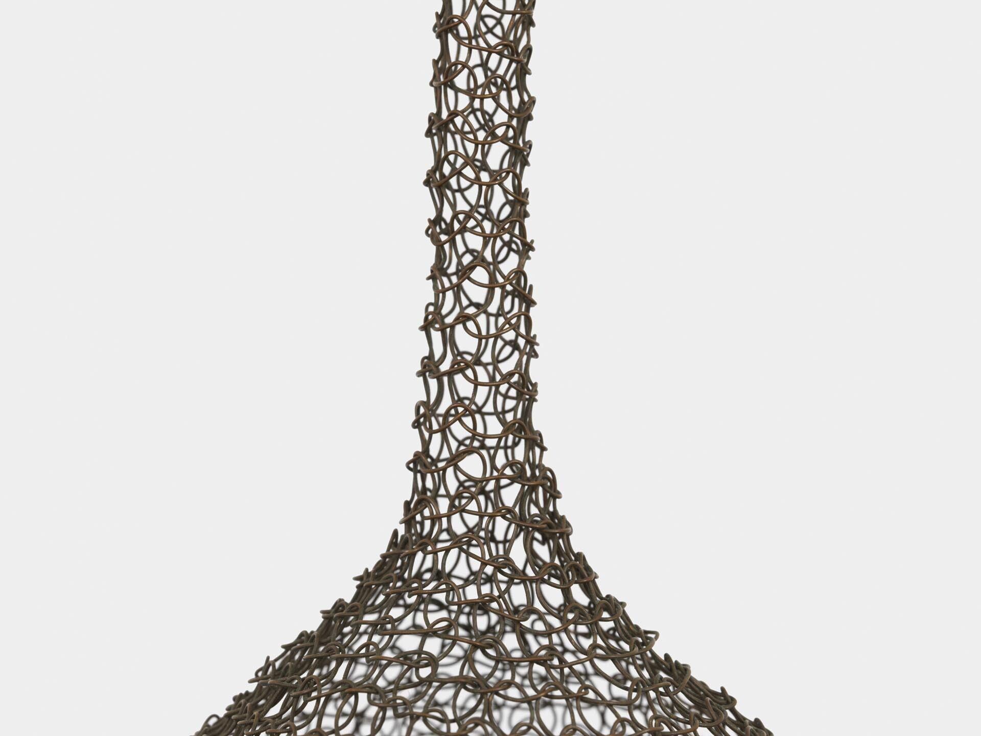 A sculpture by Ruth Asawa, titled Untitled (2.264, Hanging Two-Lobed, Continuous Form), dated 1949.