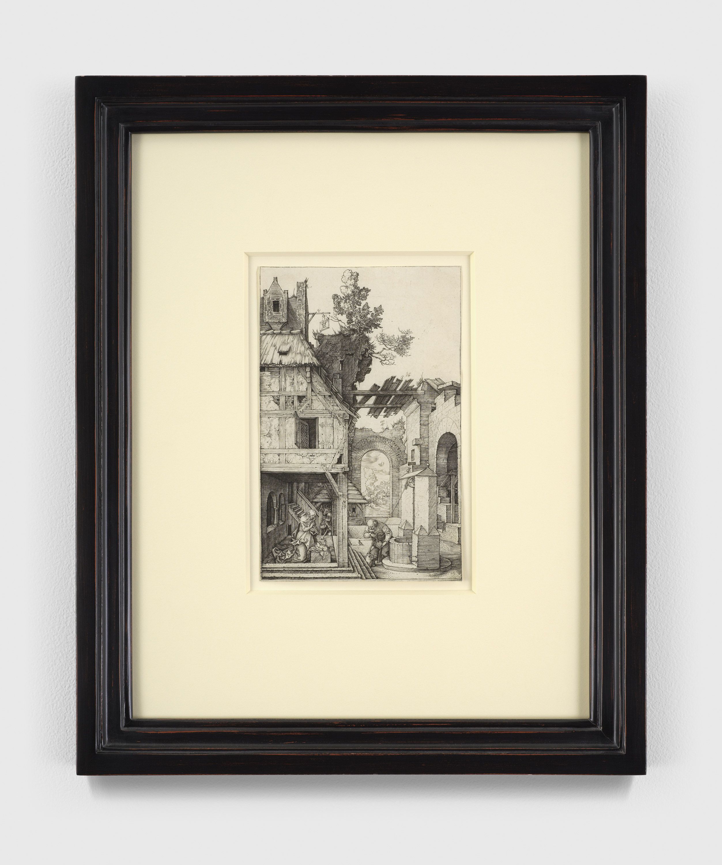 An engraving on paper by artwork, titled The Nativity, dated 1504.