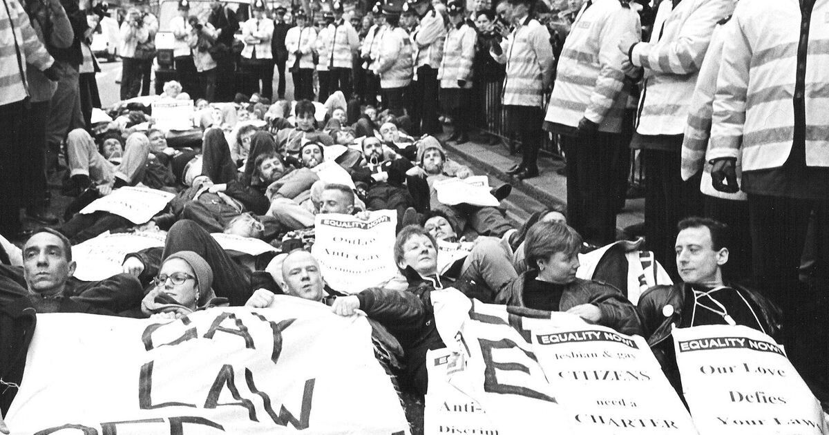 Derek Jarman (left) on the OutRage! March on Parliament with Peter Tatchell (right) and Jimmy Somerville. 