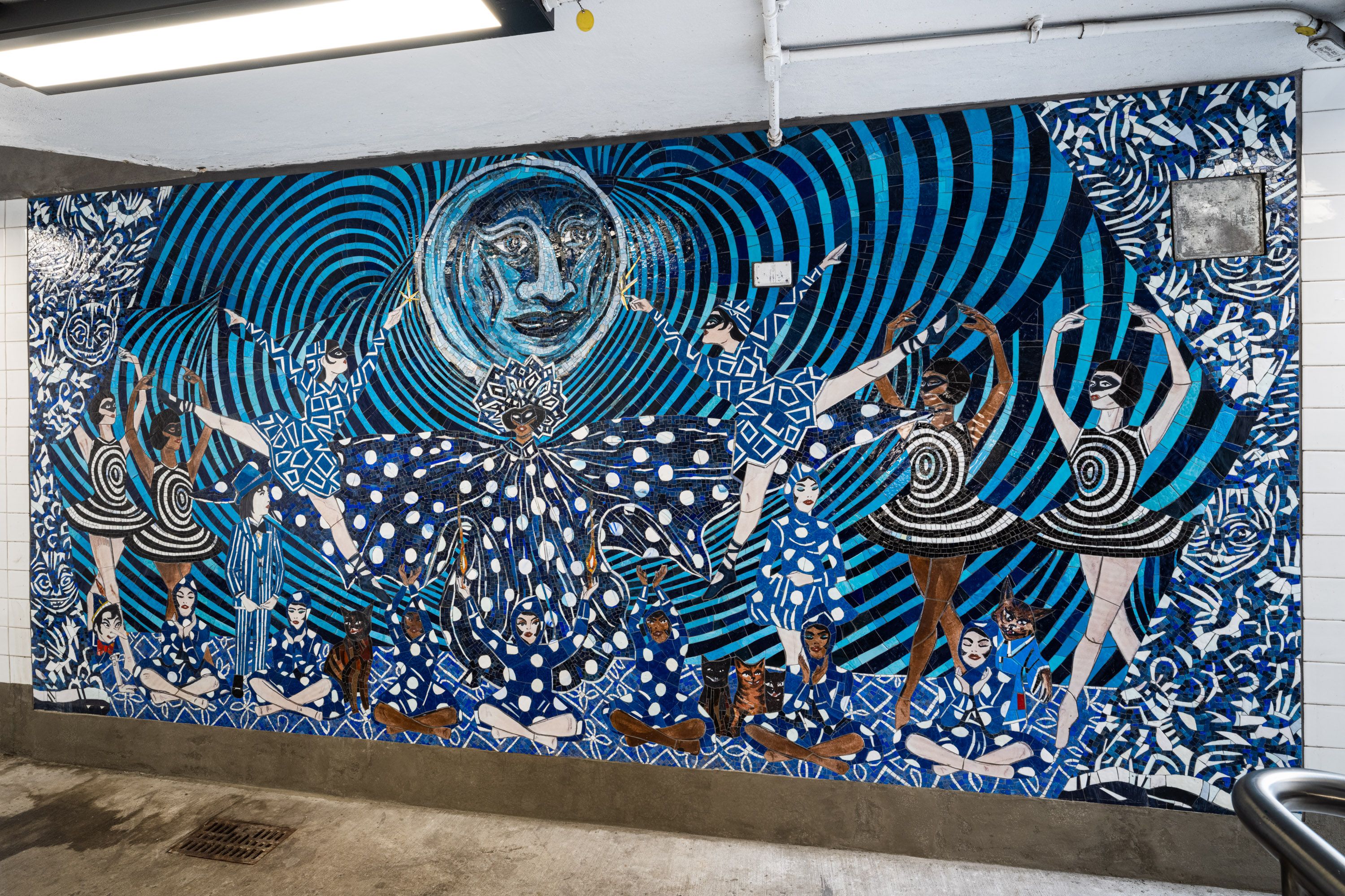 A right-angled installation view of a mosaic commissioned by MTA called No Less than Everything Comes Together by Marcel Dzama in 2021