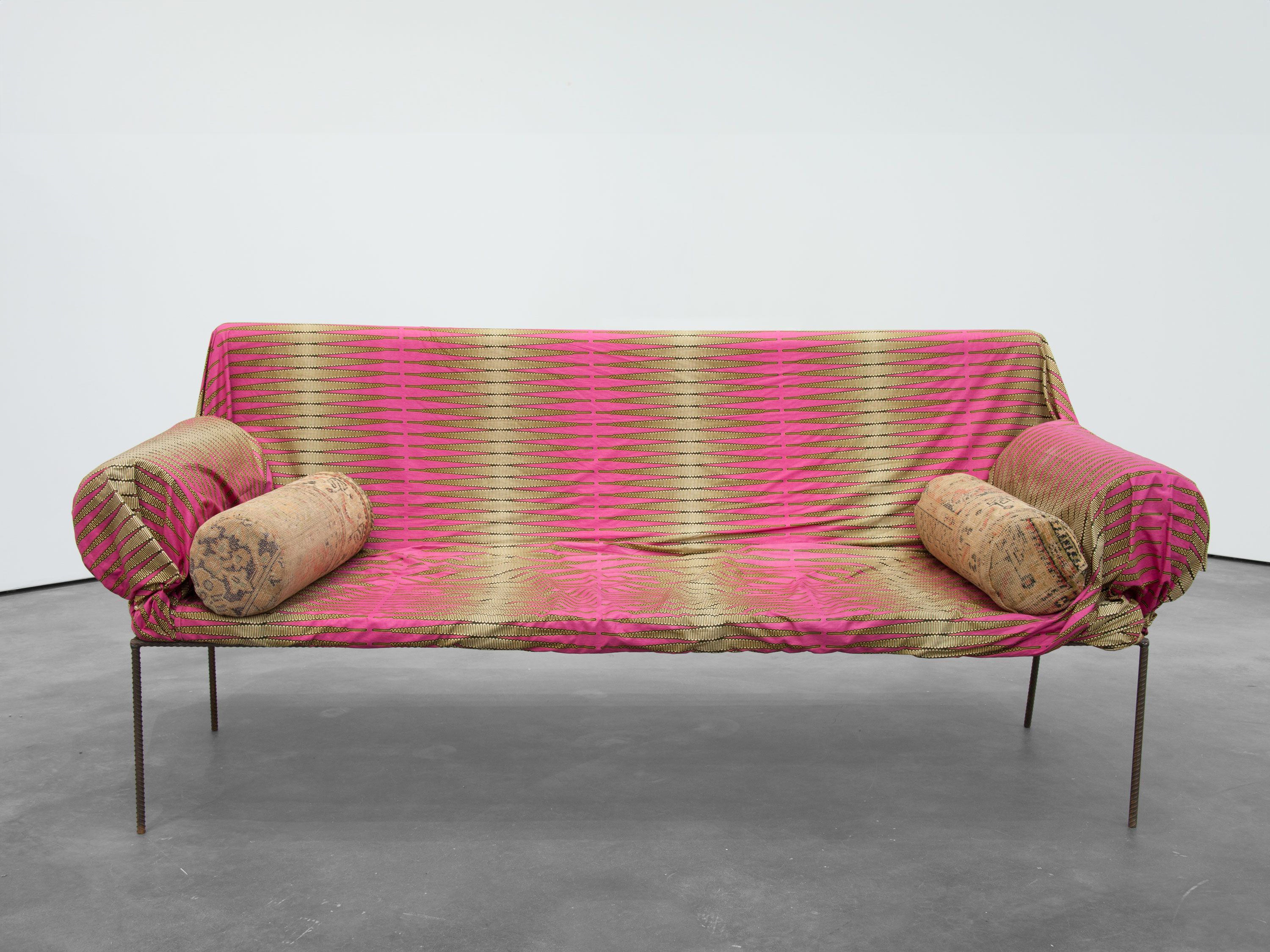A piece of furniture by Franz West, titled Divan, dated 2003.