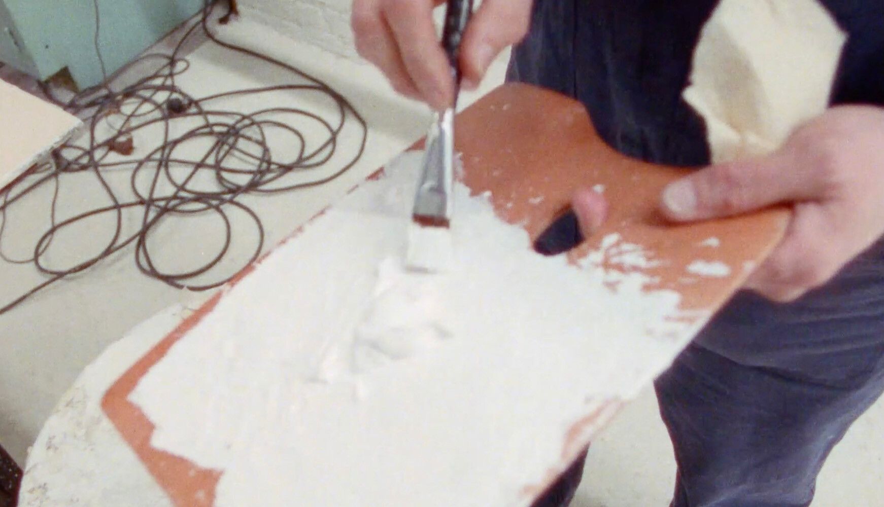 A still from 4 Artists: Robert Ryman, Eva Hesse, Bruce Nauman, Susan Rothenberg (1988) a film directed by Michael Blackwood.