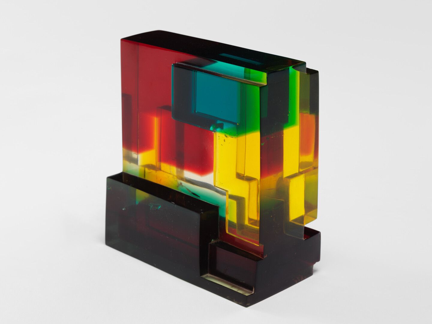 A polyester resin sculpture by Leo Amino, titled, Refractional #1, dated 1965.