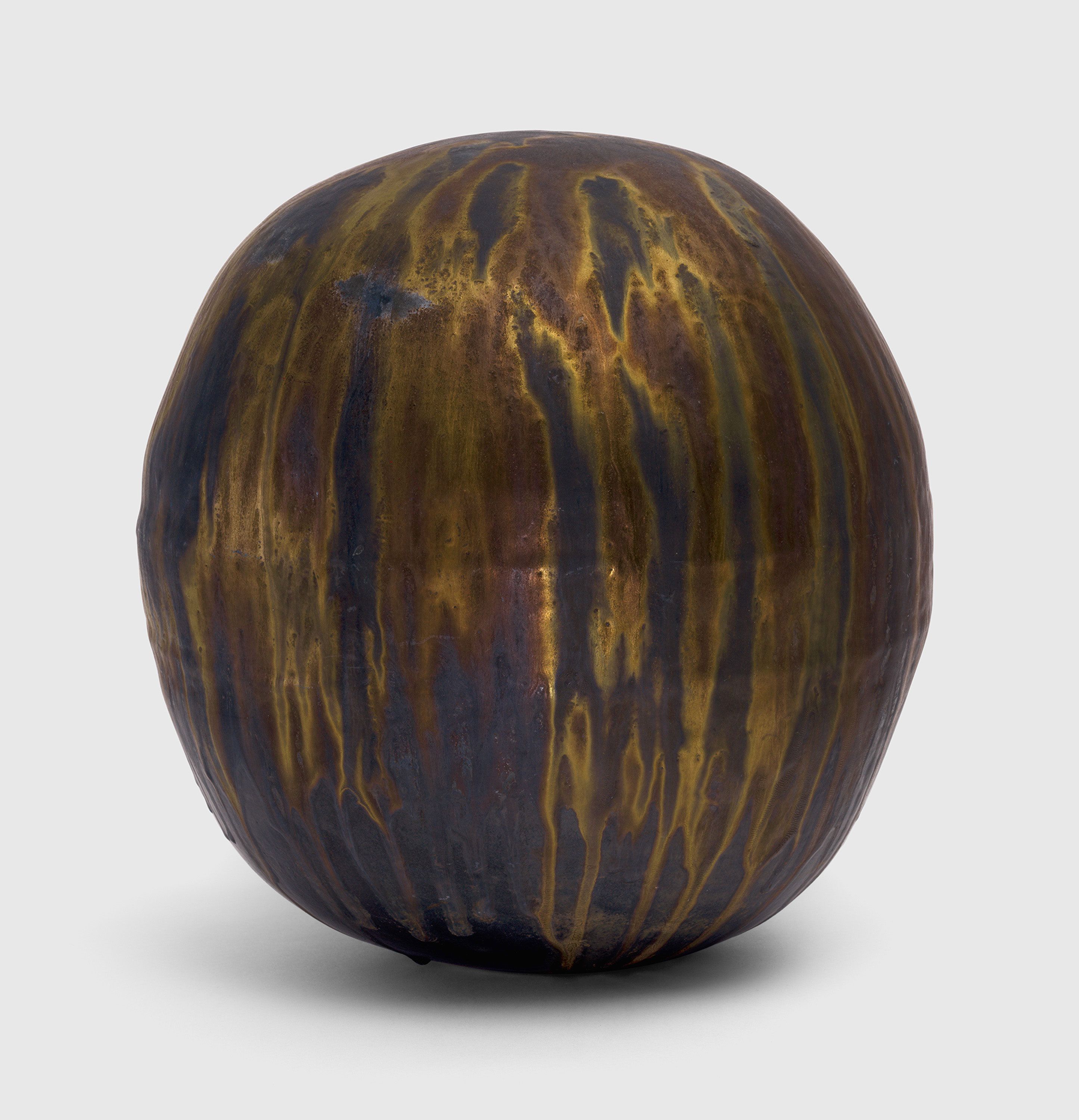 A sculpture by Toshiko Takaezu, titled Alchemy Gold Moon, circa 1990 to 1993.