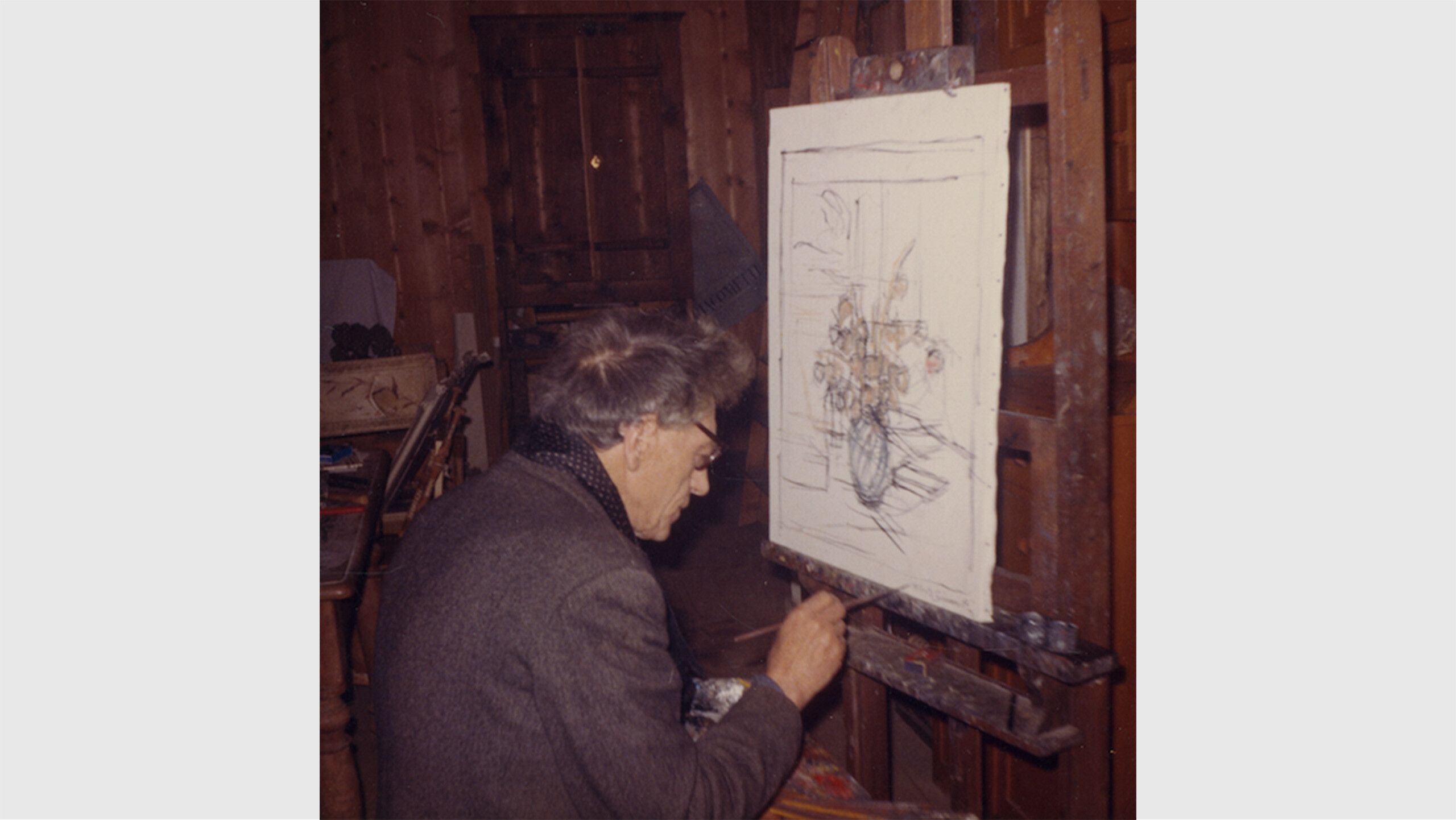 A photo of Alberto Giacometti working in his atelier at Stampa, n.d.