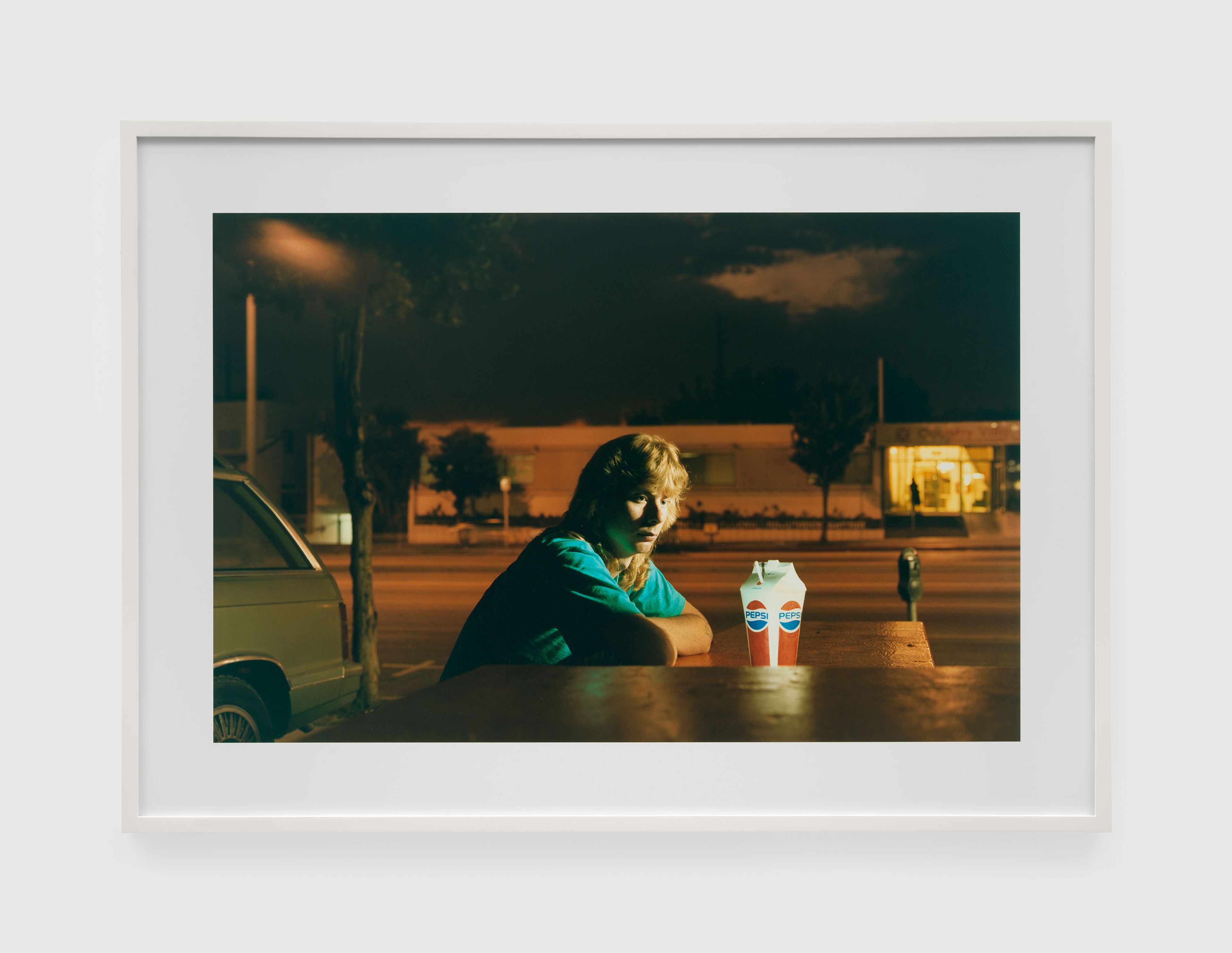 A photograph by Philip-Lorca diCorcia titled Brent Booth; 21 years old; Des Moines, Iowa, dated 1990 to 1992.