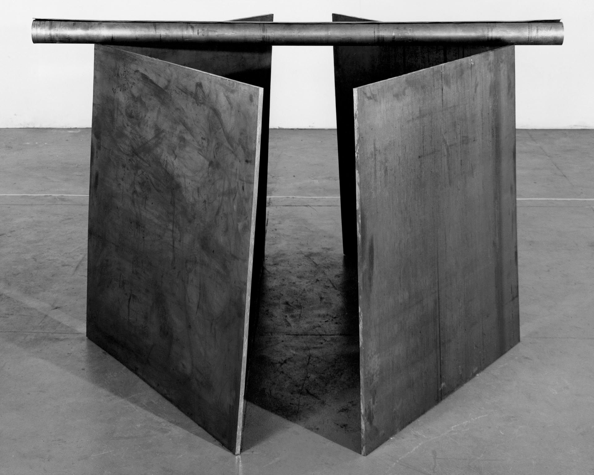 A lead sculpture by Richard Serra, titled 5:30, dated 1969.