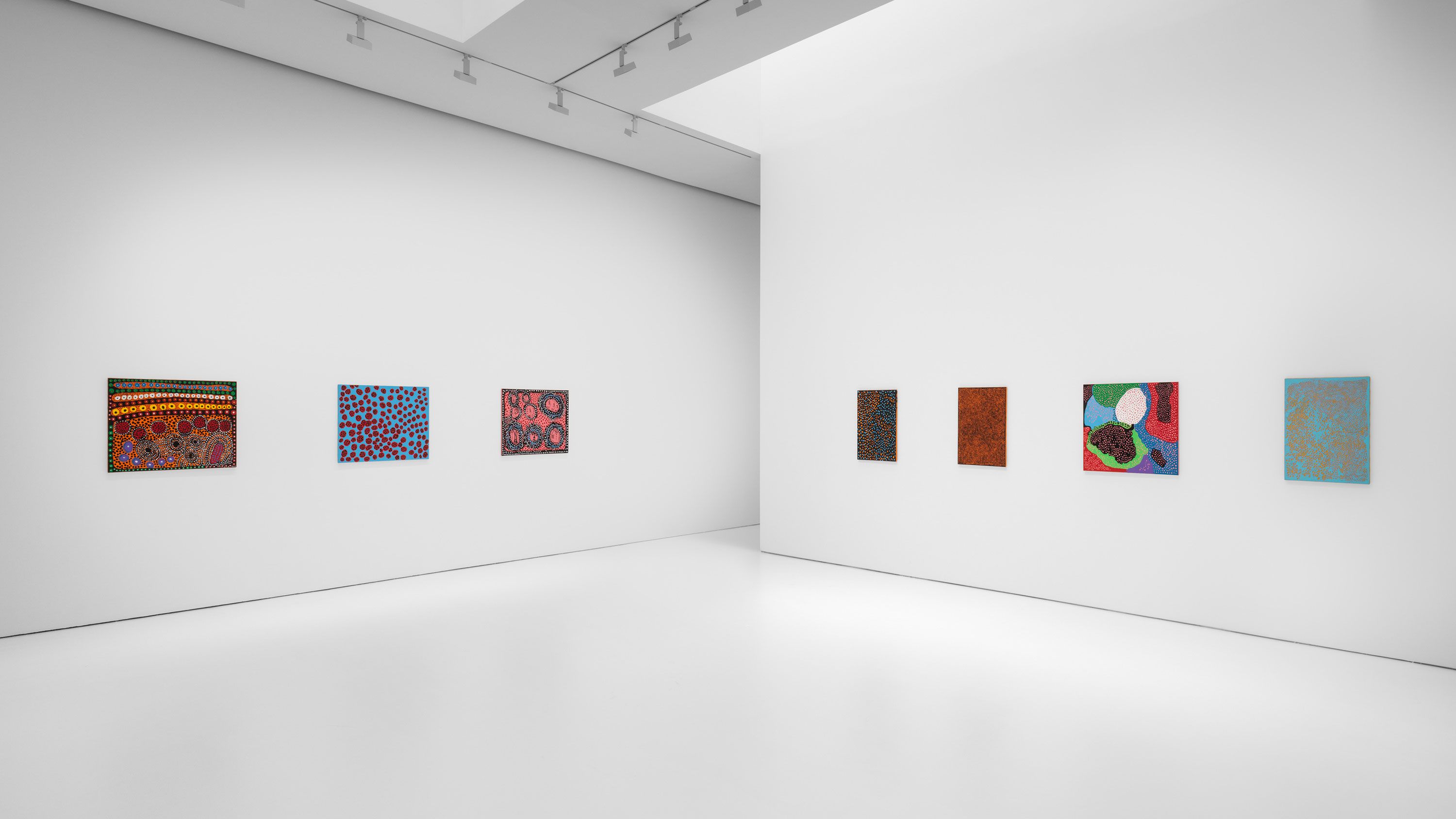 An installation view of the exhibition titled Yayoi Kusama, I Spend Each Day Embracing Flowers, dated 2023