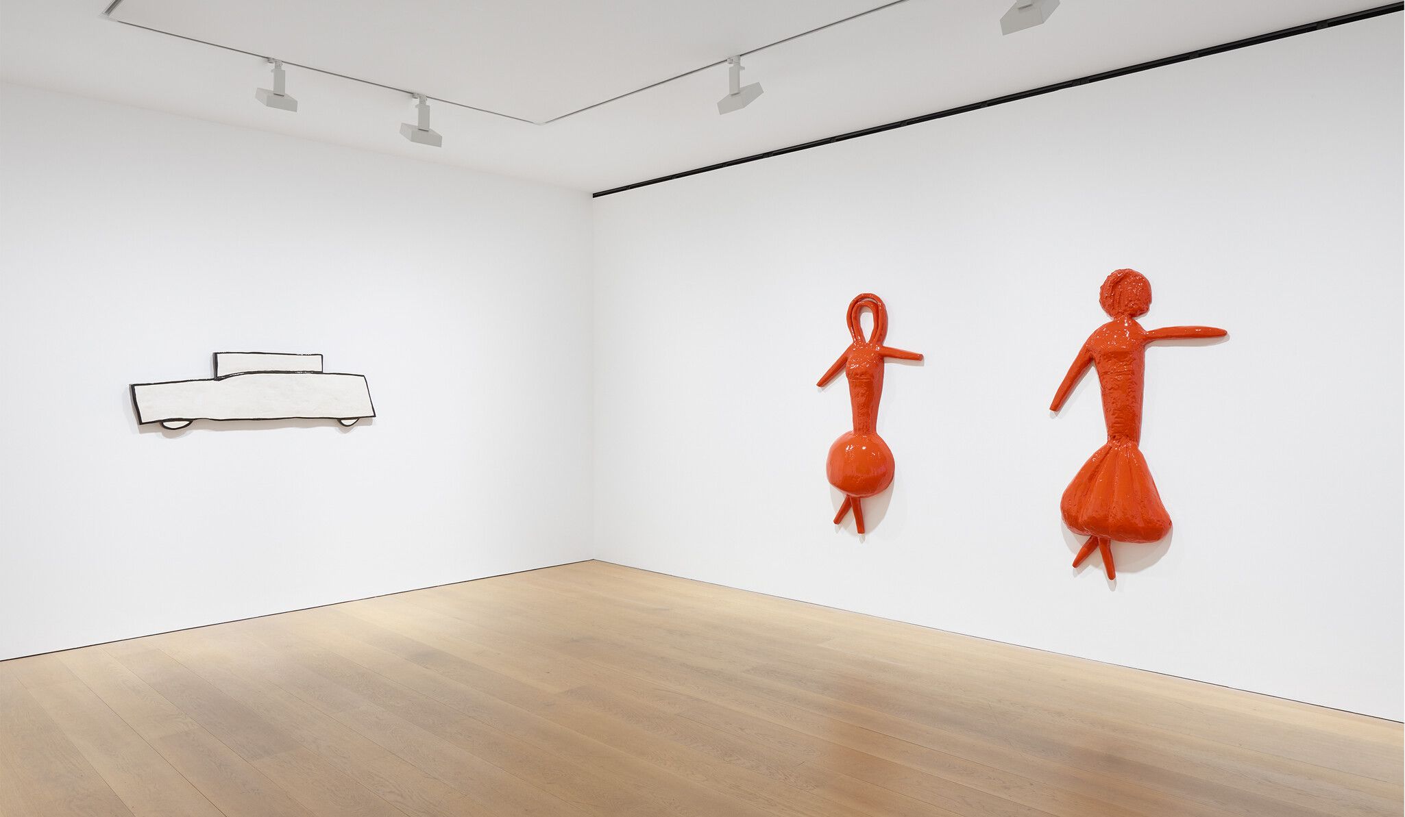 Installation view of White Car, Red Girl (no face), and Red Girl (face) by Rose Wylie