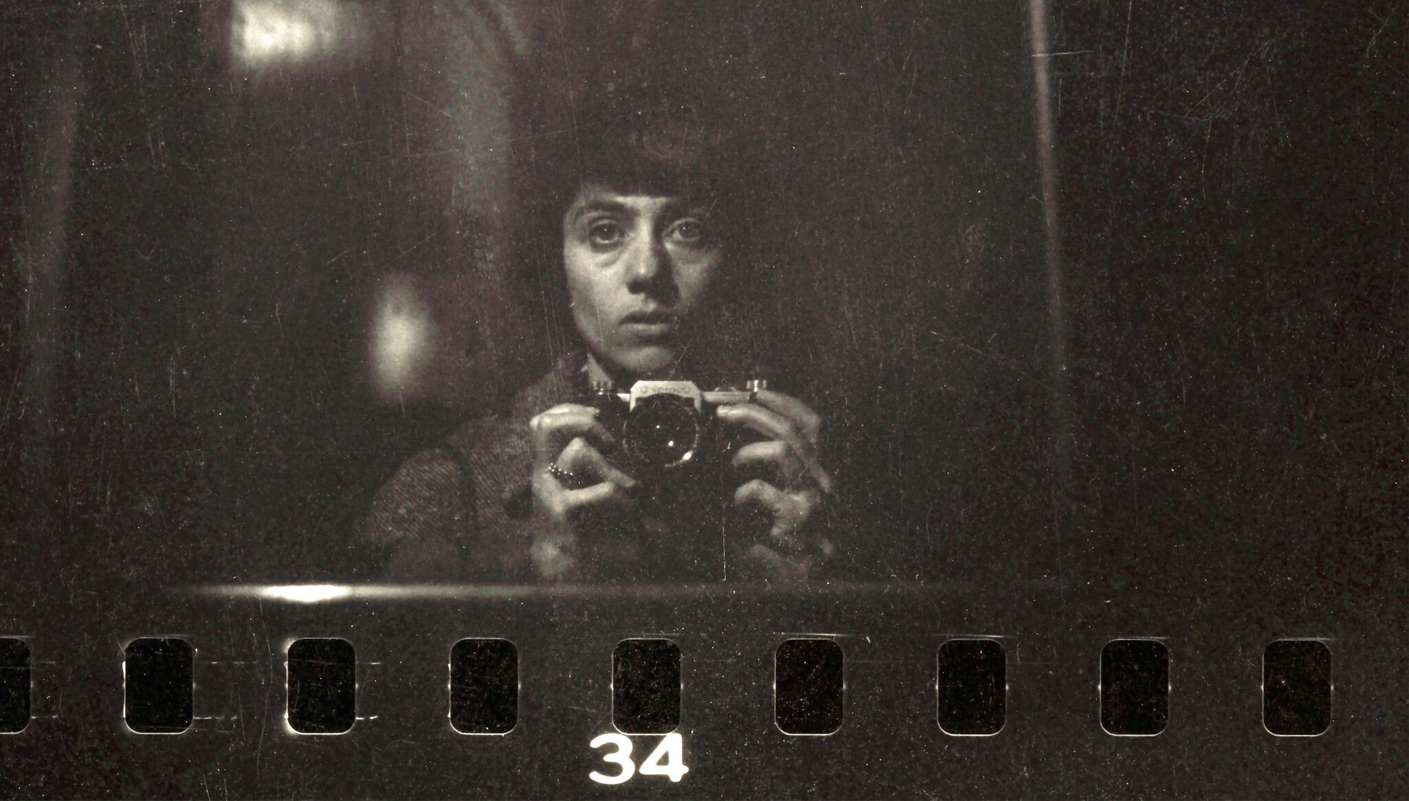 Diane Arbus, Self-portrait with 35mm Contax D camera, dated 1959