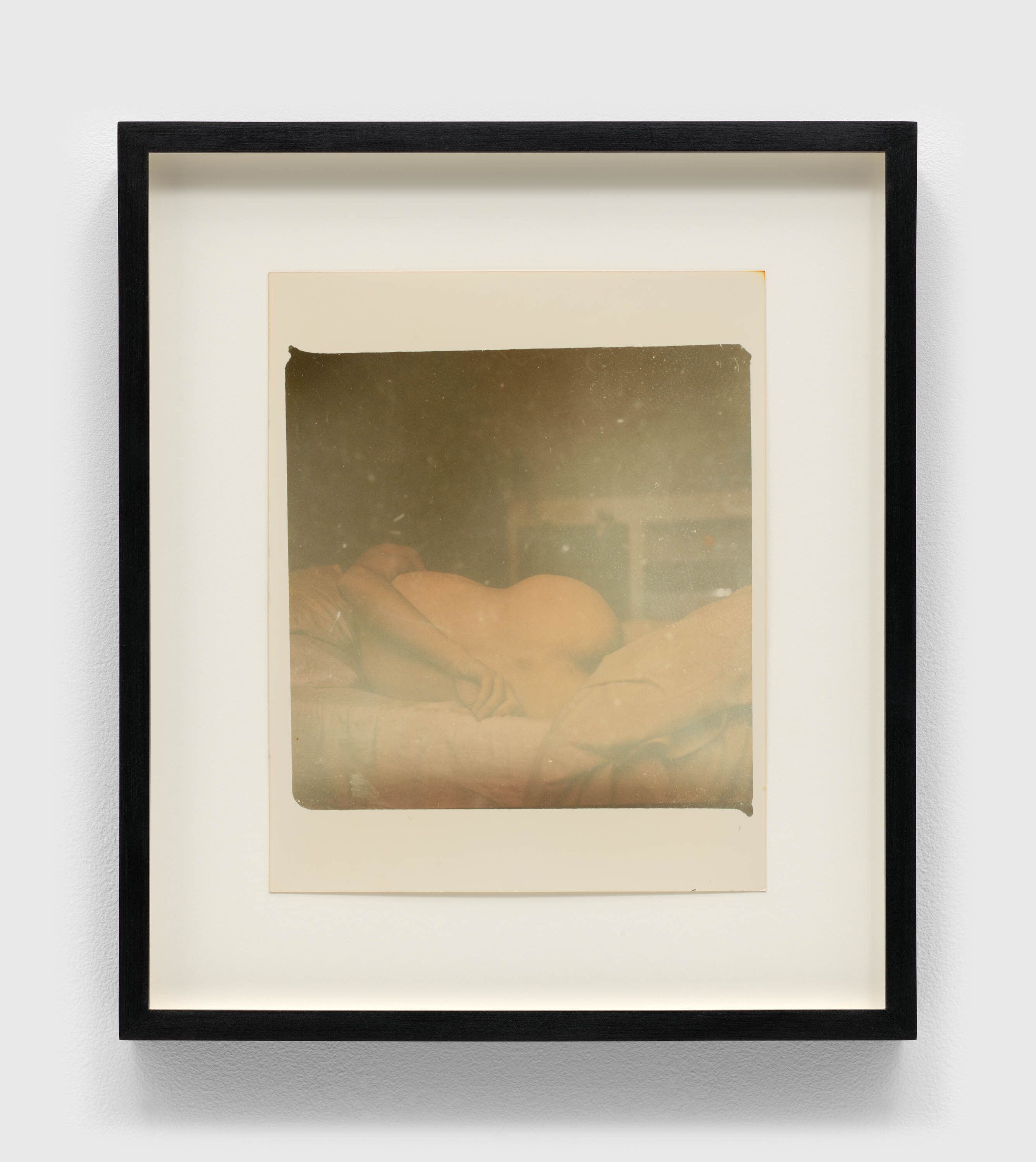 A photograph by Mark Morrisroe, titled Untitled (My Bottom Line in the Home of a Rubber Fetishist, London), dated 1982.
