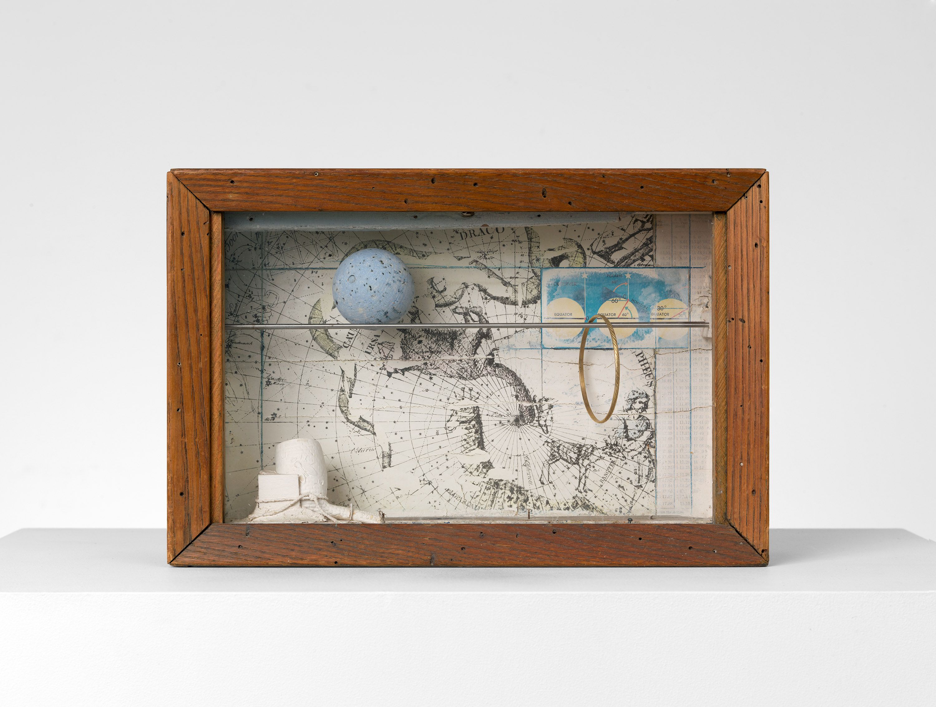 A mixed media in wooden box artwork by Joseph Cornell, titled Untitled, 1956 to 1958.