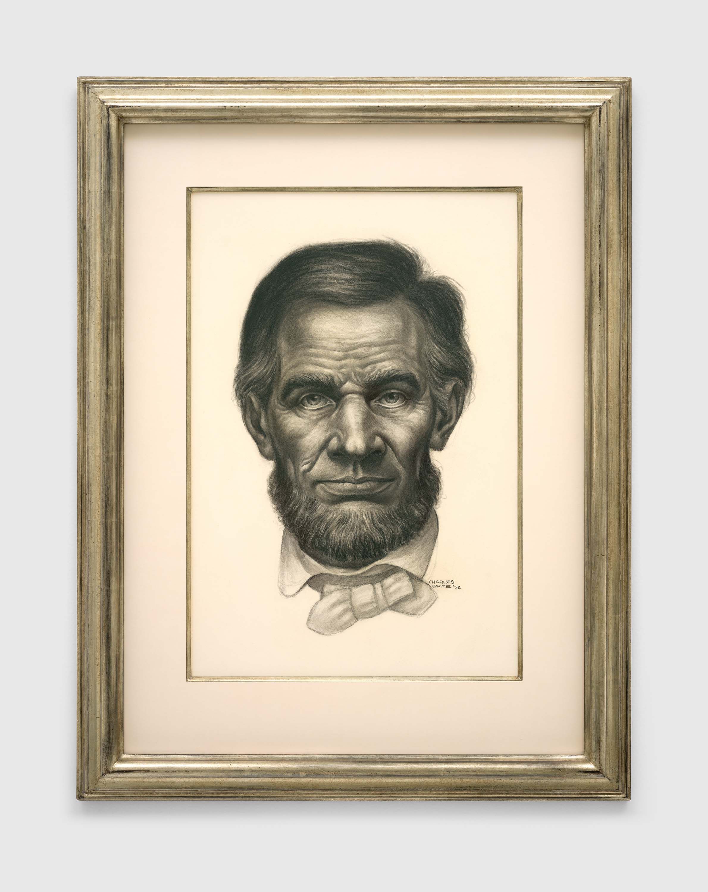 A work on paper by Charles White, titled Abraham Lincoln, dated 1952.