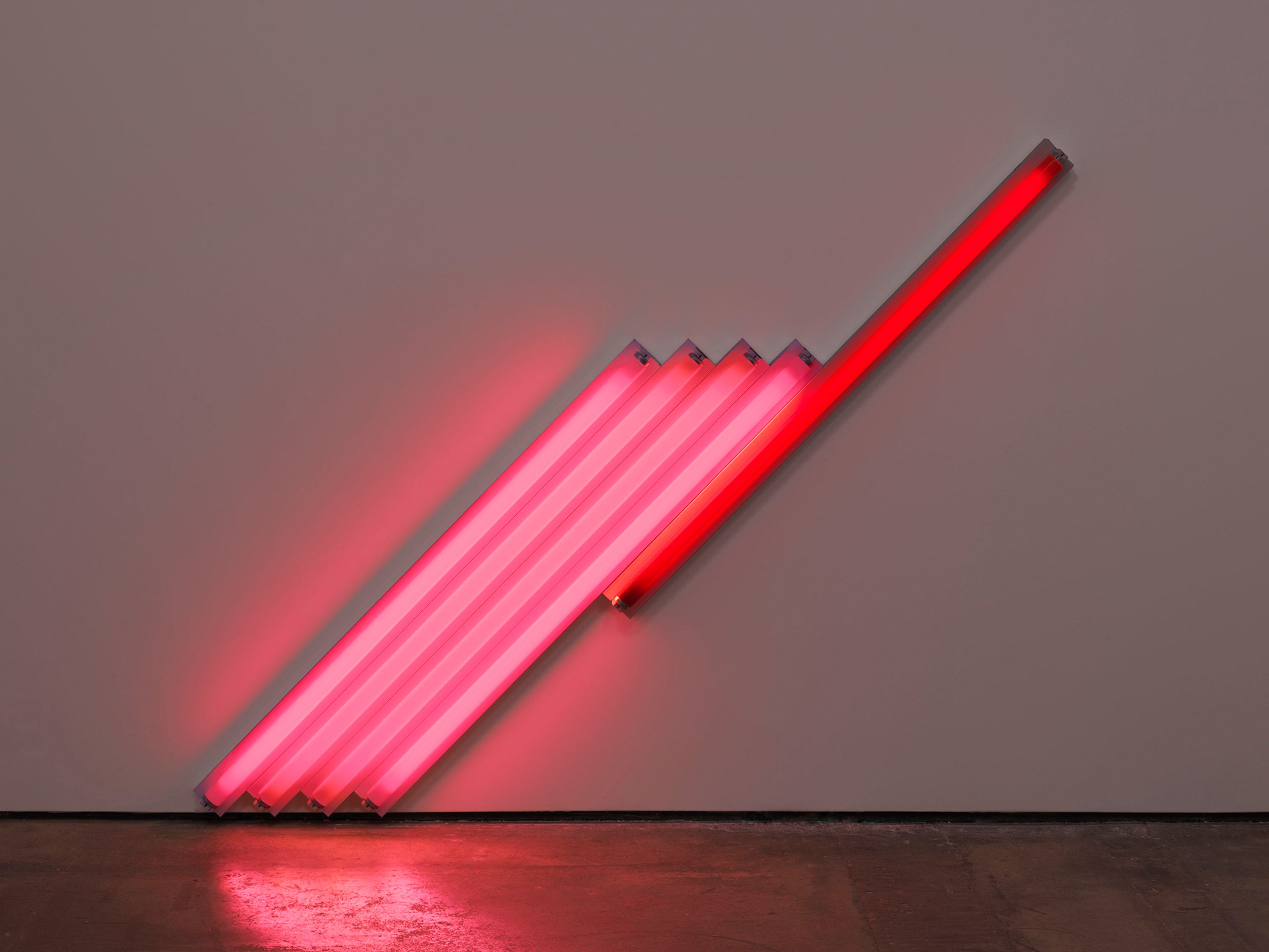 A pink and red fluorescent light sculpture by Dan Flavin, titled untitled (for Frederika and Ian) 1, dated 1987.